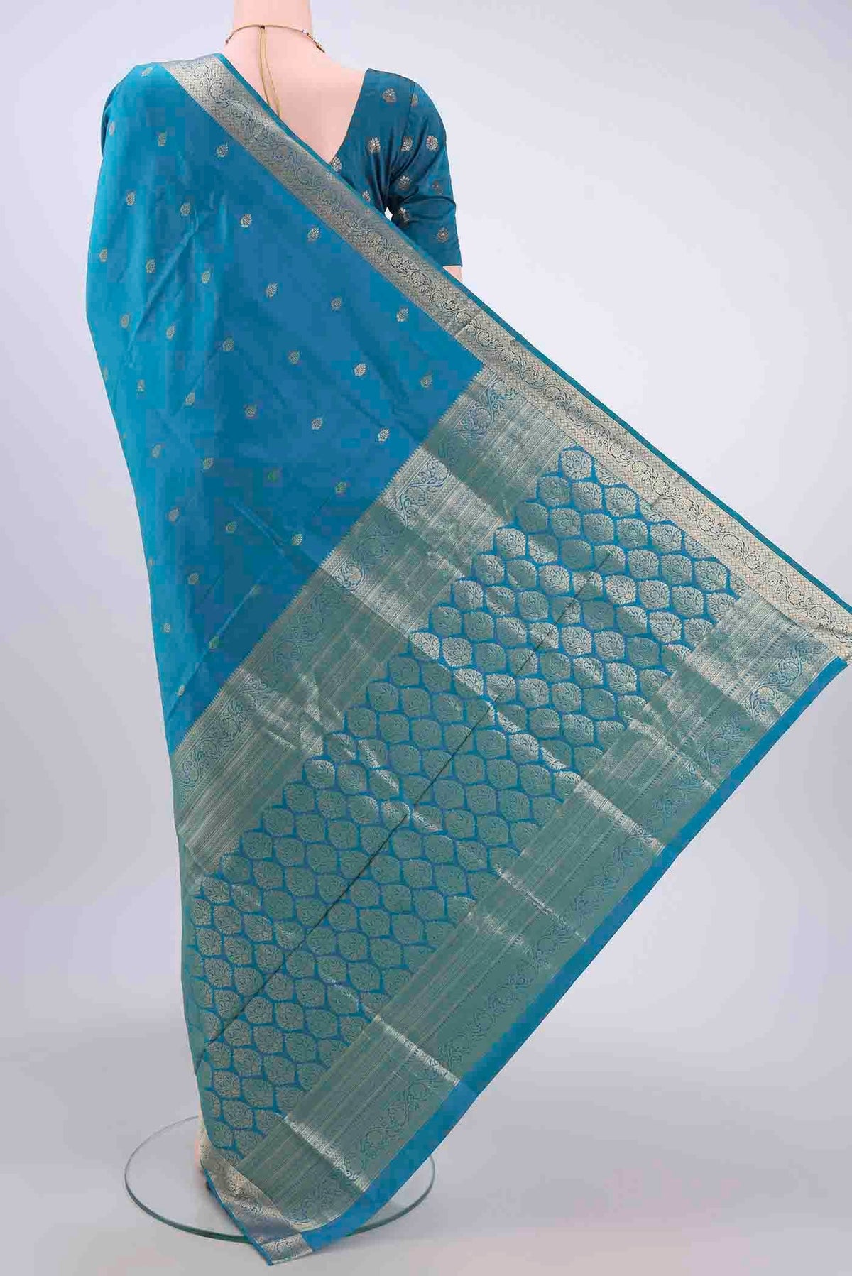 Flat view of Blue Dual Tone Soft Silk Saree with Zari Butta on the body and Zari Border