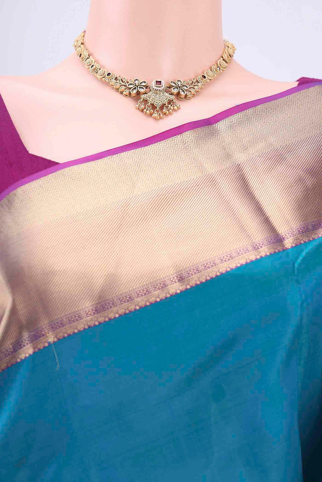 Border image of Blue Dual Tone Soft Silk Saree with Plain Body and Zari Border