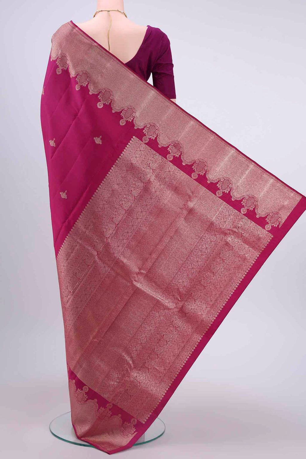 Flat view of Dark Pink Kanchipuram Saree with Zari Butta on the body and Zari Border