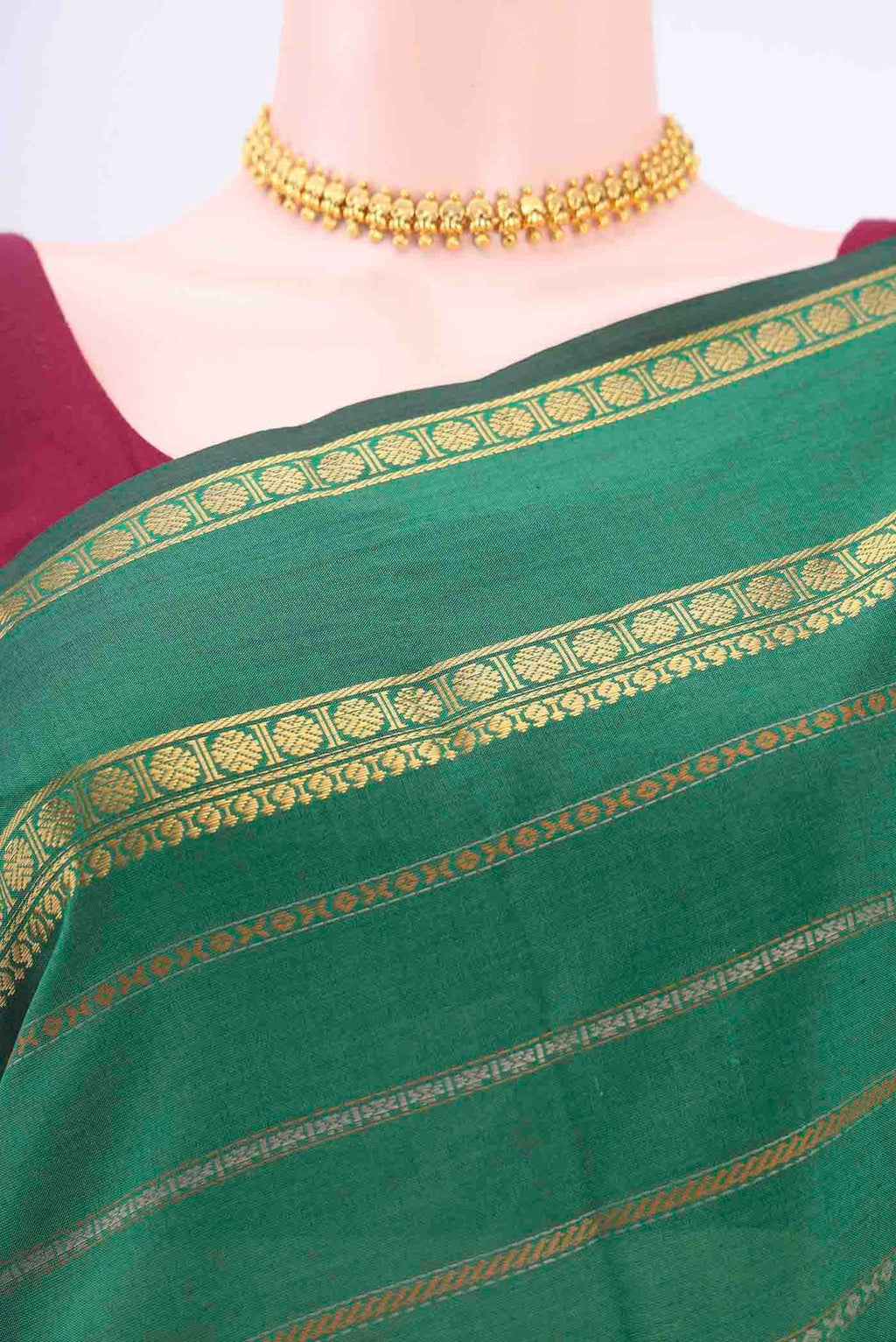 Border image of Green Blended Poly Cotton Saree with Stripes on the body and Zari Border