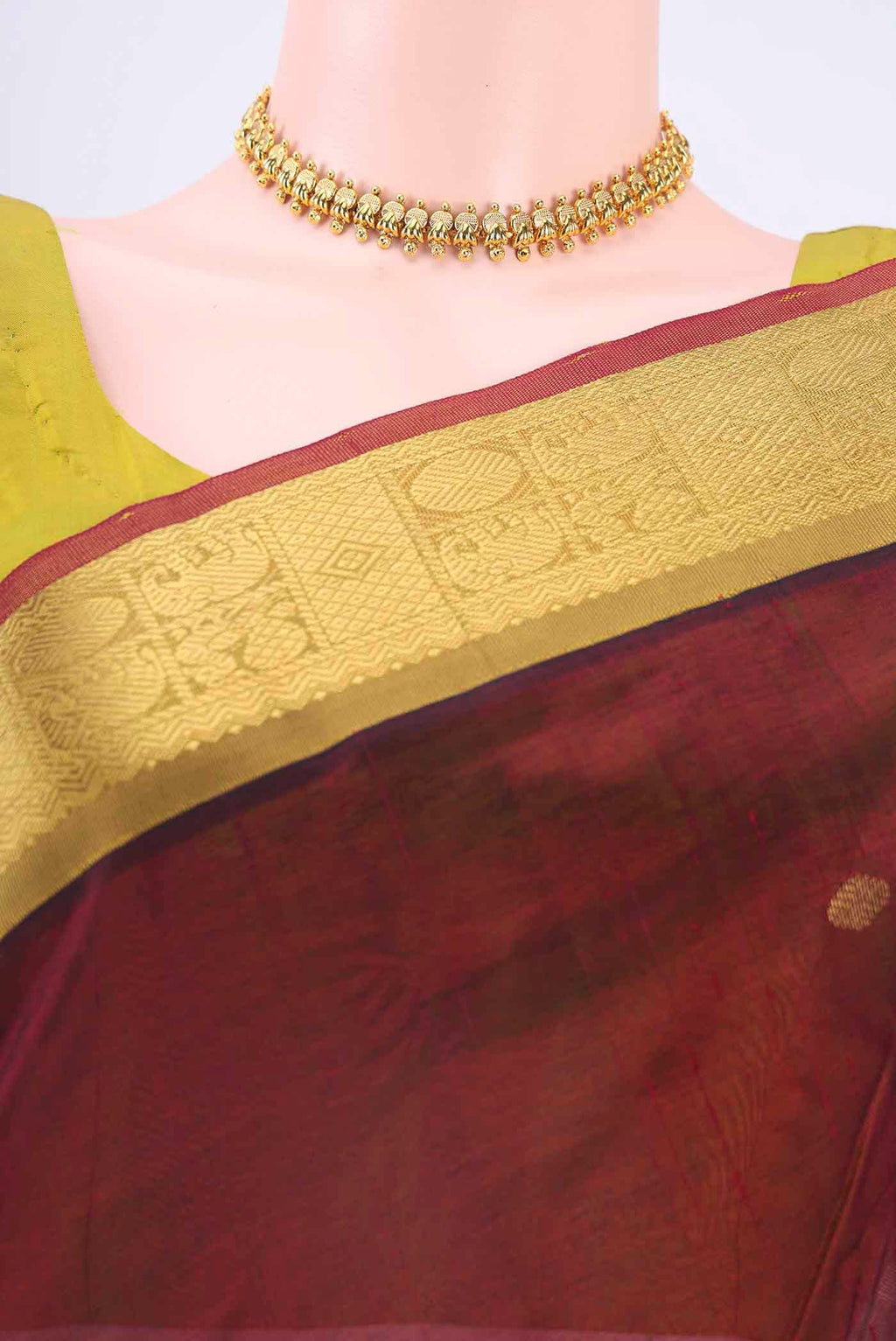 Border image of Maroon Blended Coimbatore Silk Cotton Saree with Zari Butta on the body and Zari Border