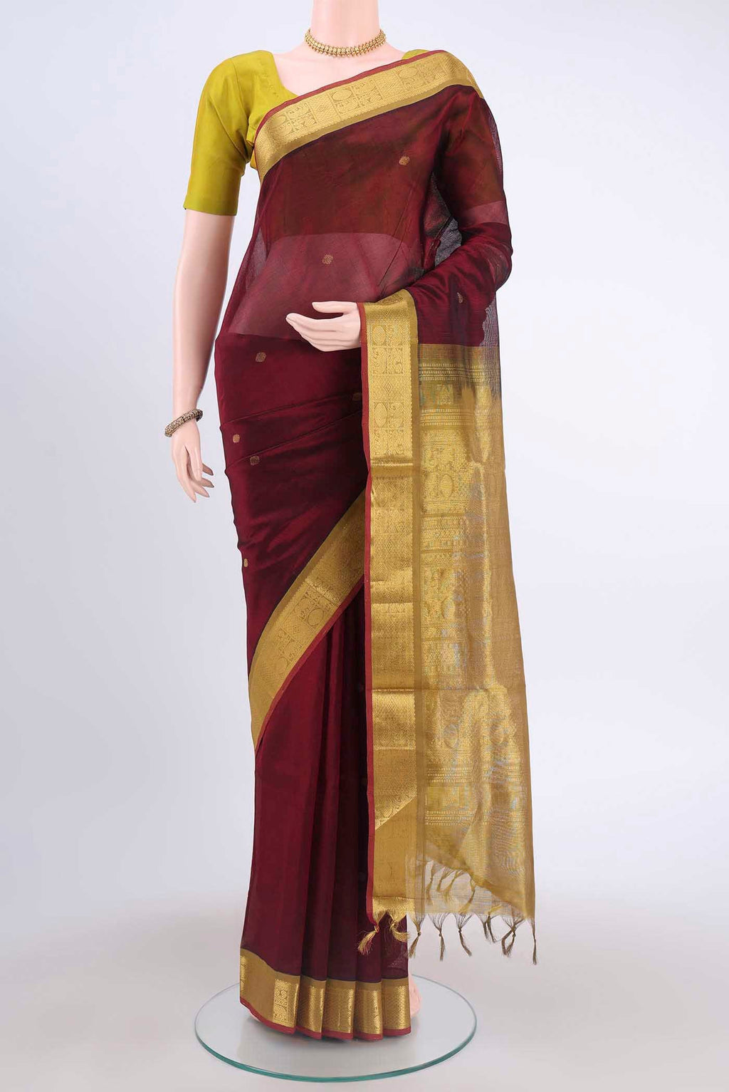 Maroon Blended Coimbatore Silk Cotton Saree with Zari Butta on the body and Zari Border displayed on a mannequin