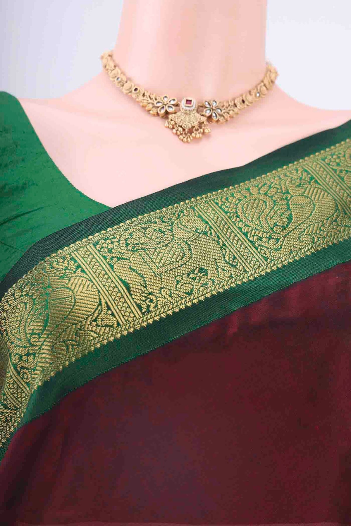 Border image of Maroon Silk Cotton Saree with Plain Body and Zari Border