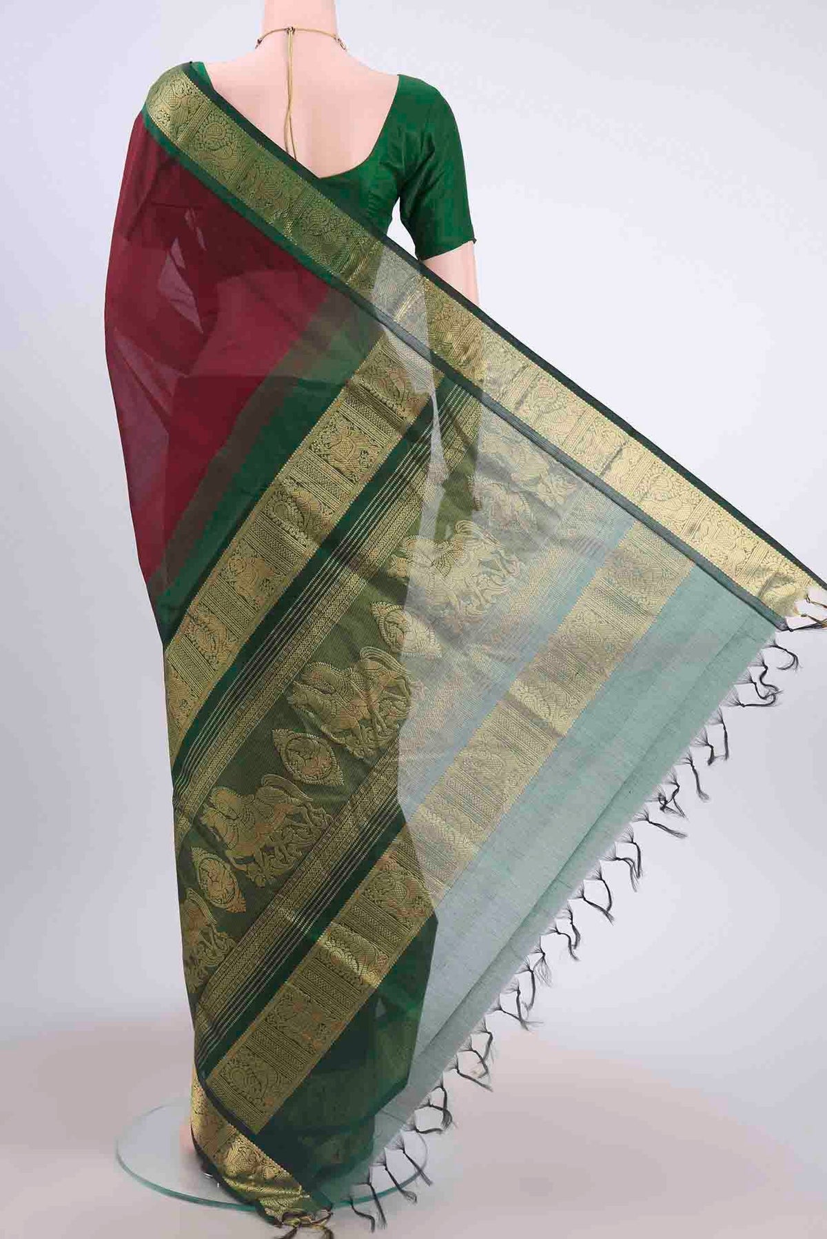 Flat view of Maroon Silk Cotton Saree with Plain Body and Zari Border