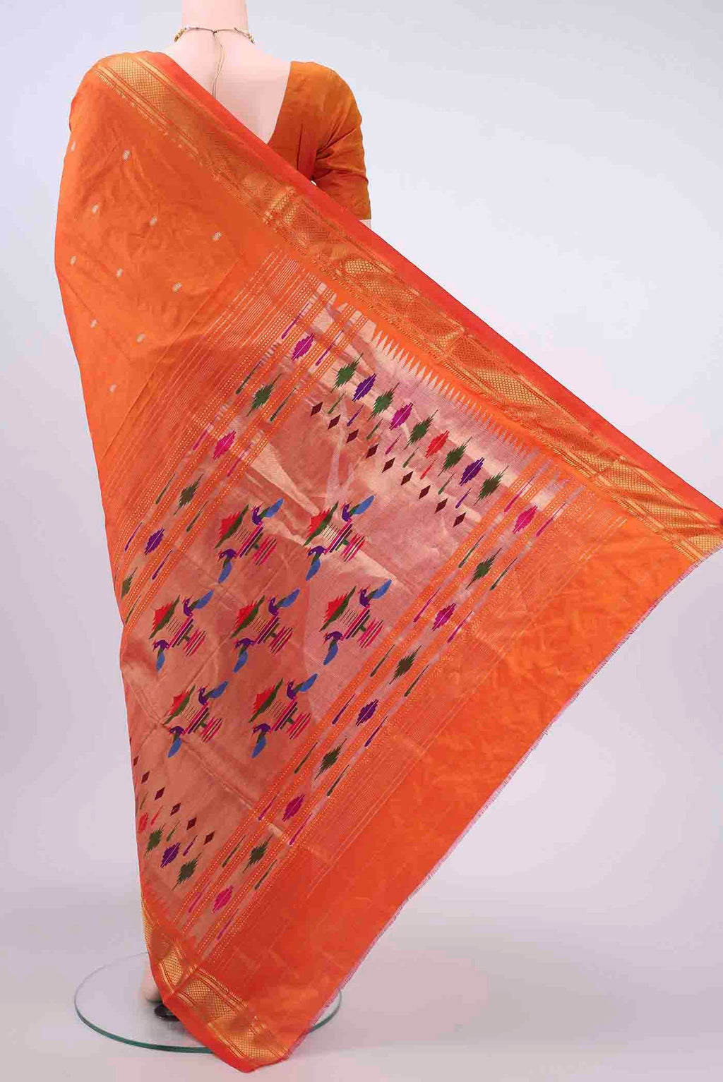 Flat view of Brick Orange Paithani Silk Saree with Zari Butta on the body and Zari Border