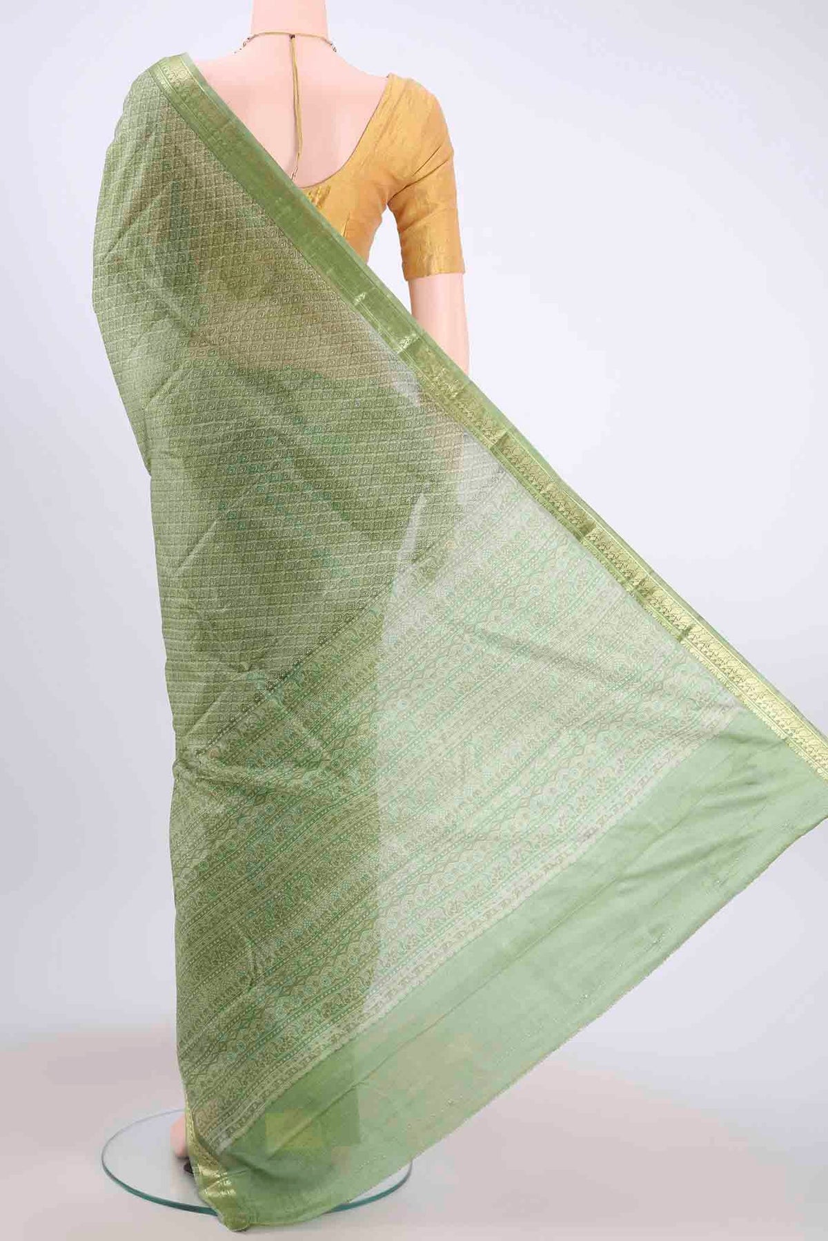 Flat view of Light Green Printed Silk Saree with Floral Print on the body and Zari Border
