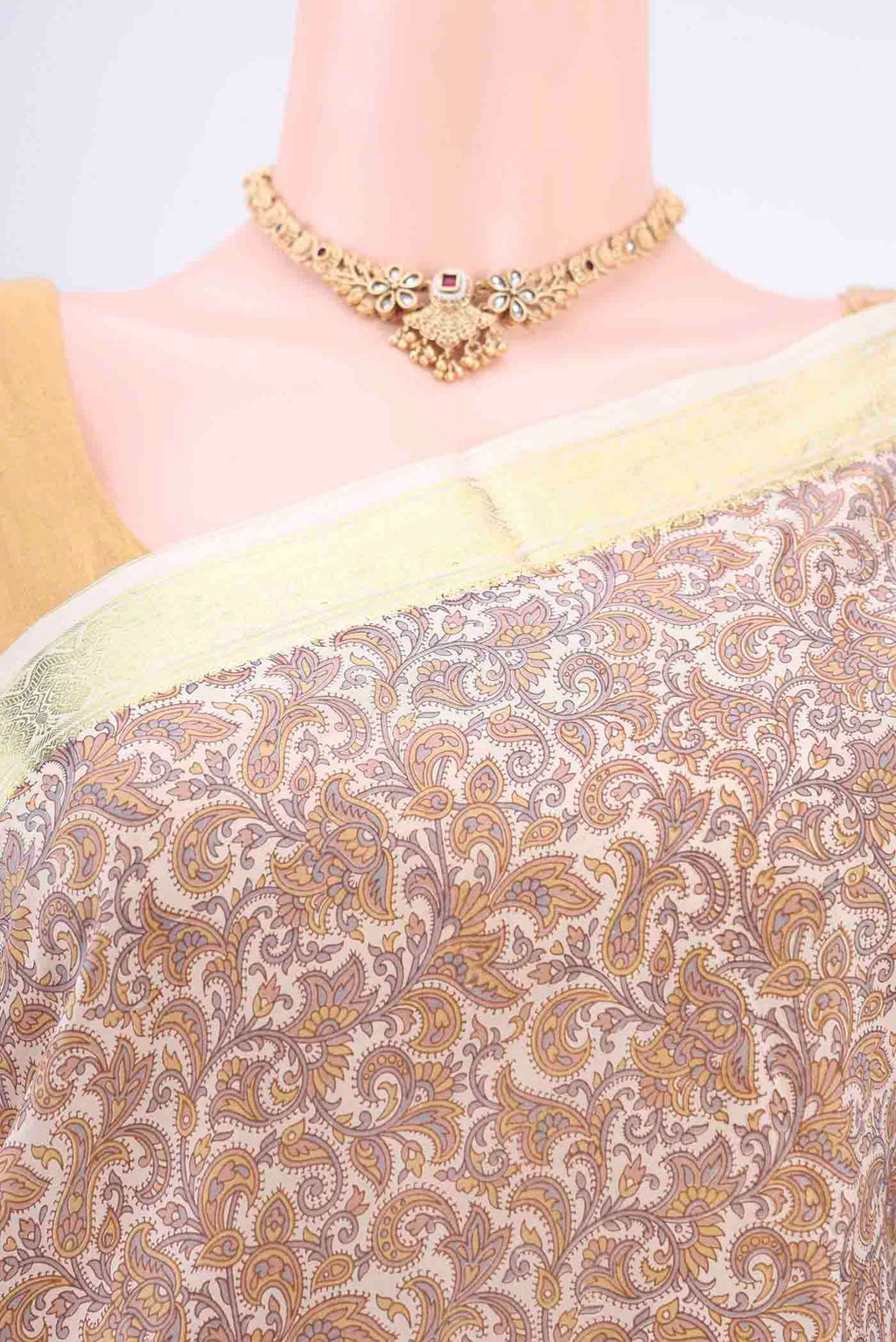 Border image of Off White Printed Silk Saree with Floral Print on the body and Zari Border