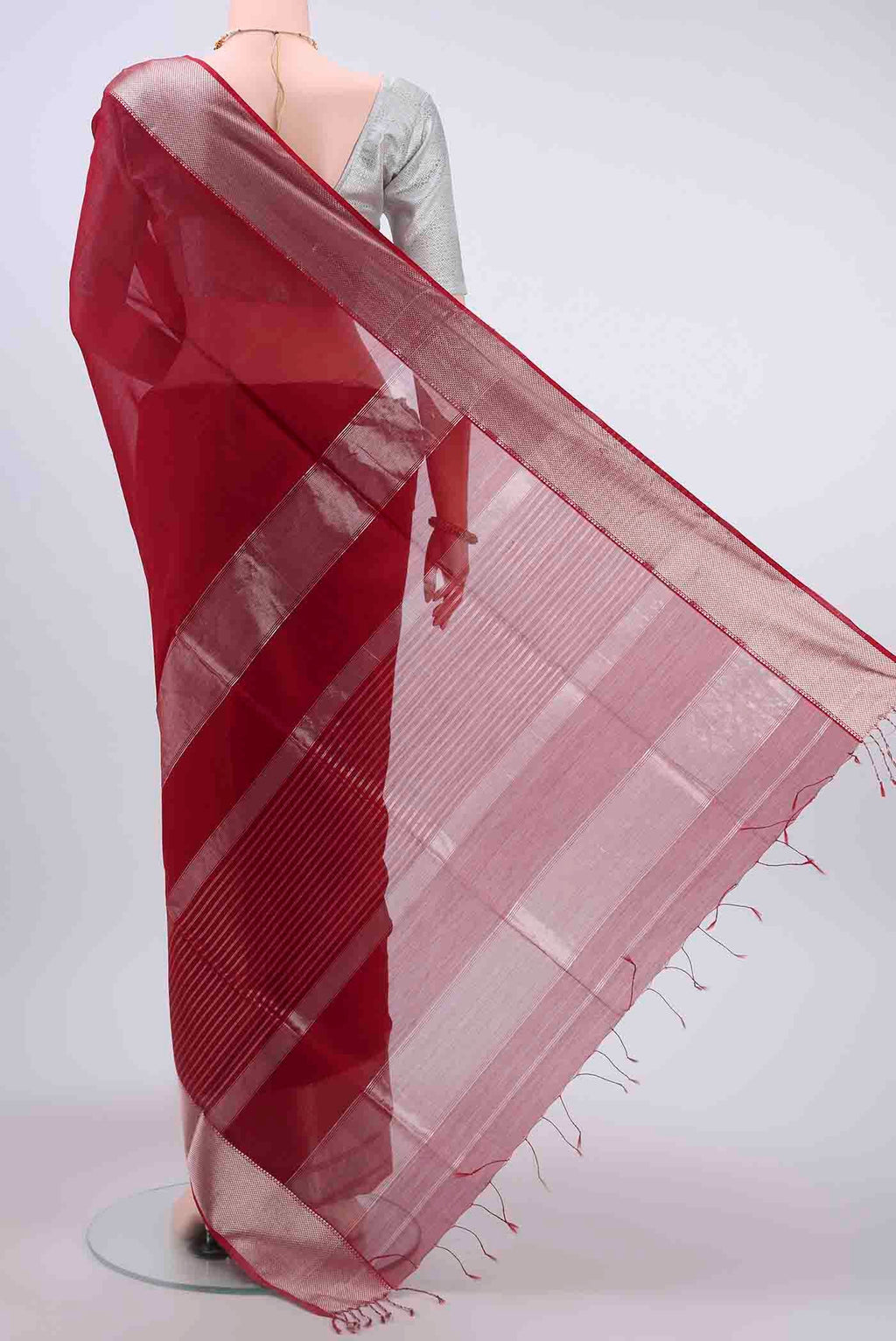 Flat view of Maroon Maheshwari Silk Cotton Saree with Plain Body and Zari Border