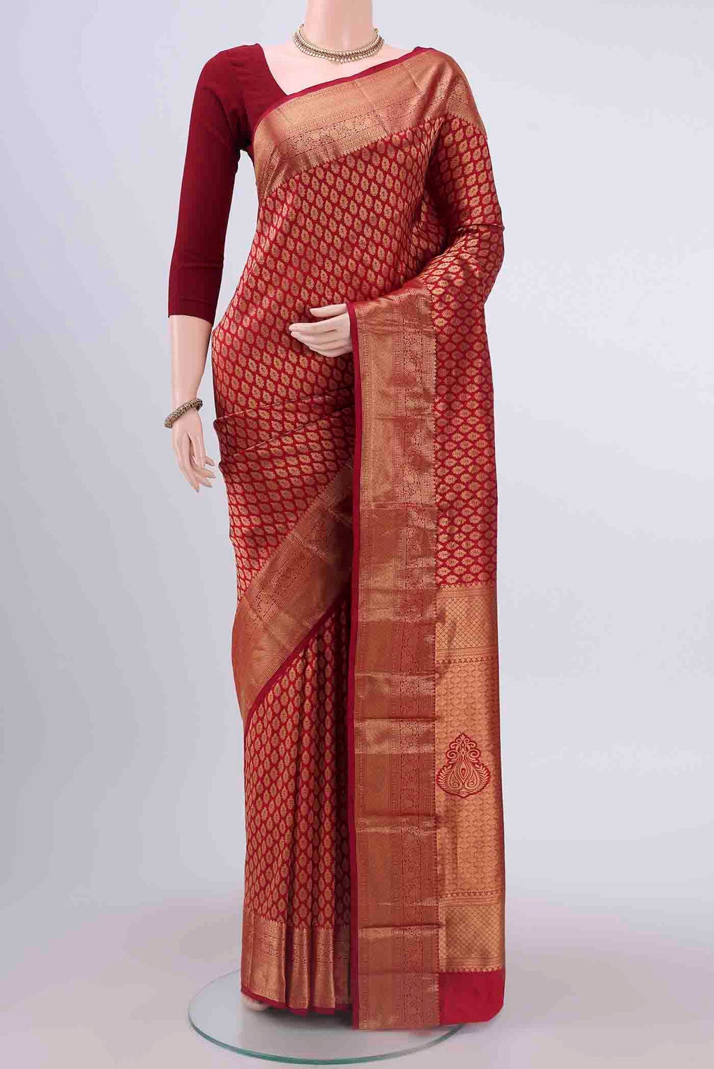 Maroon Bangalore Silk Saree with Zari Brocade on the body and Zari Border displayed on a mannequin