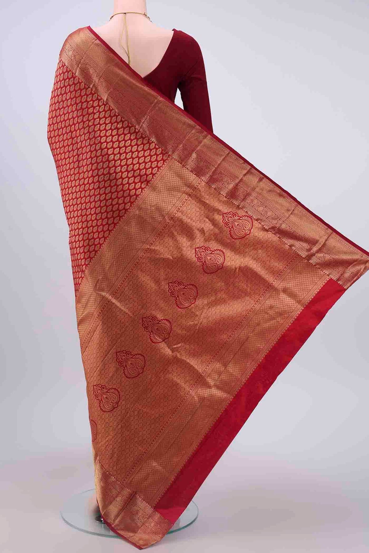 Flat view of Maroon Bangalore Silk Saree with Zari Brocade on the body and Zari Border