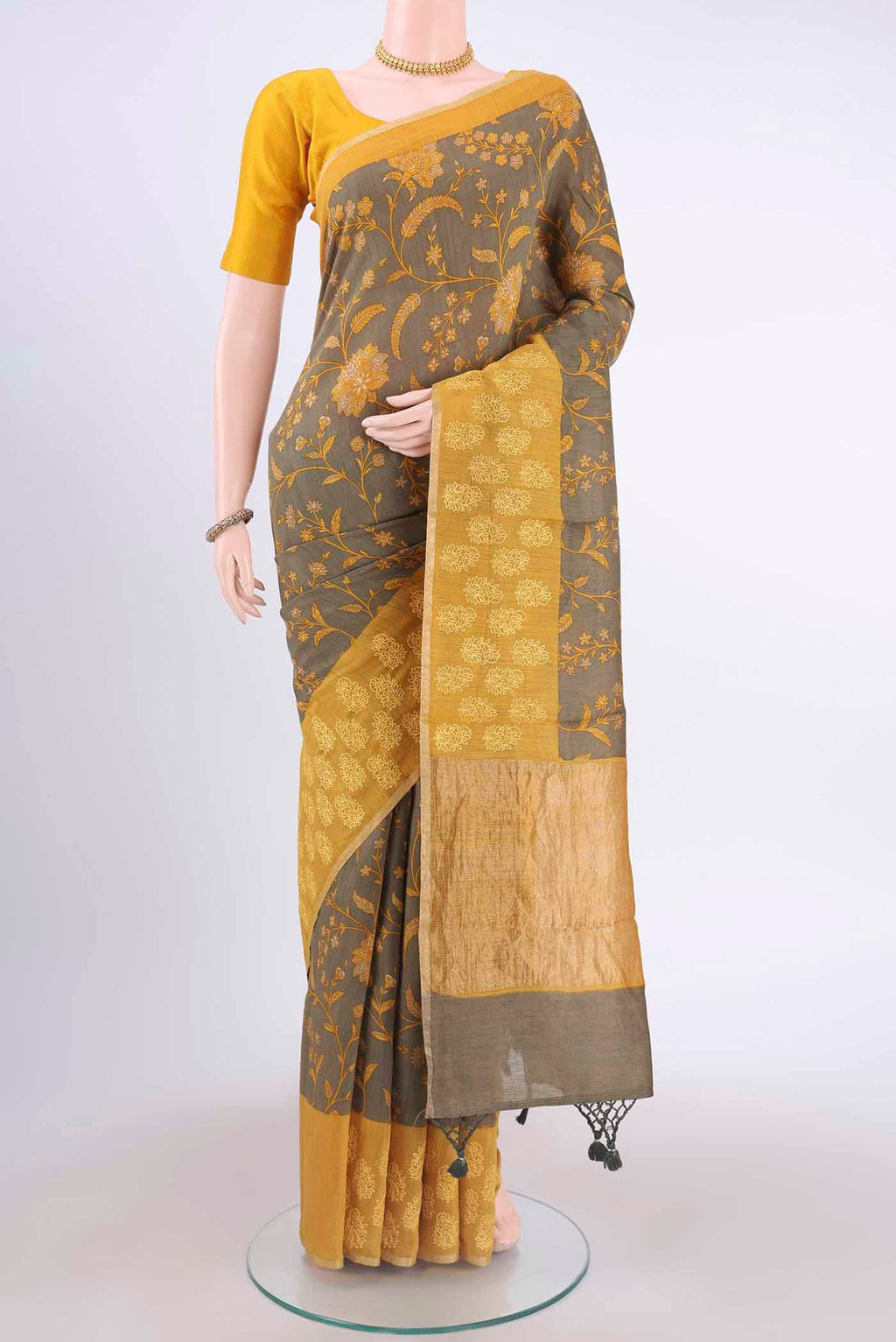 Davys Grey Dual Tone Tussar Silk Saree with Printed design on the body and Thread Border displayed on a mannequin