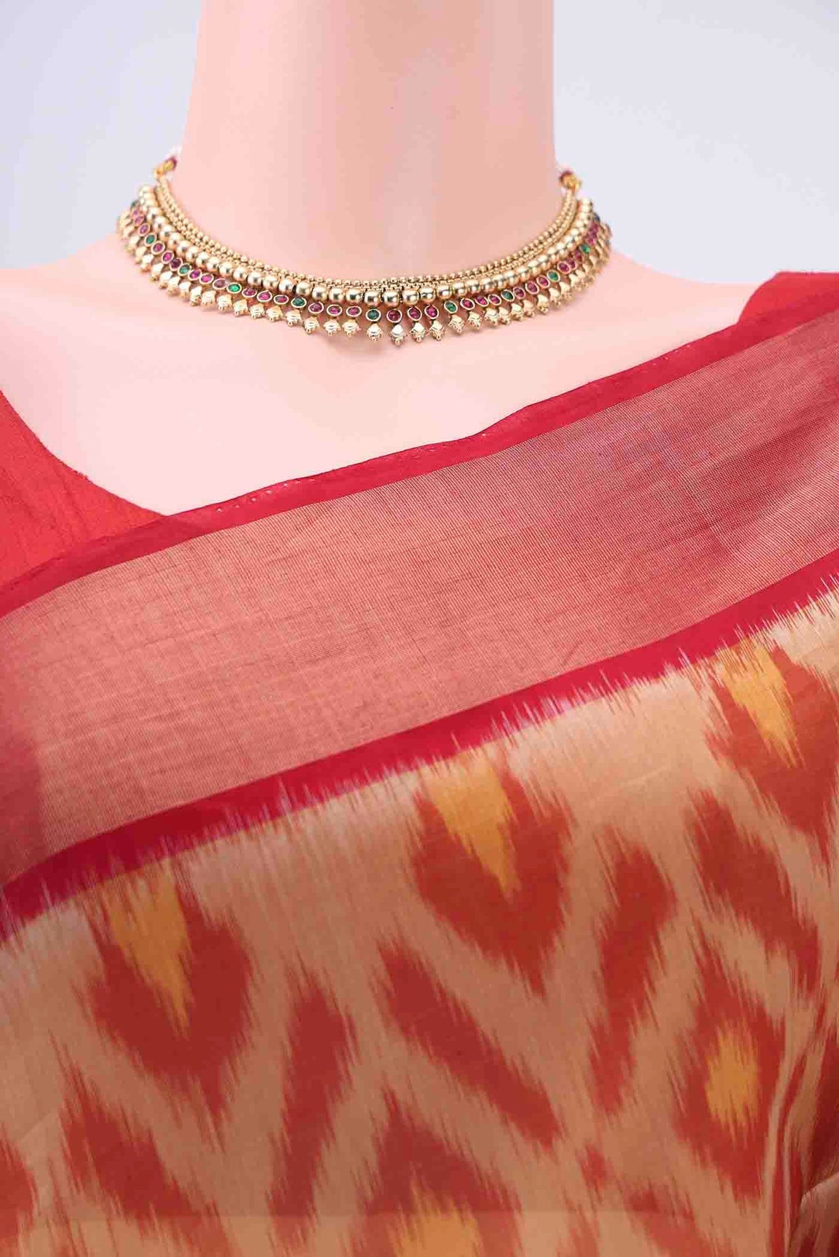 Border image of Beige Kora Cotton Saree with Ikat design on the body and Zari Border