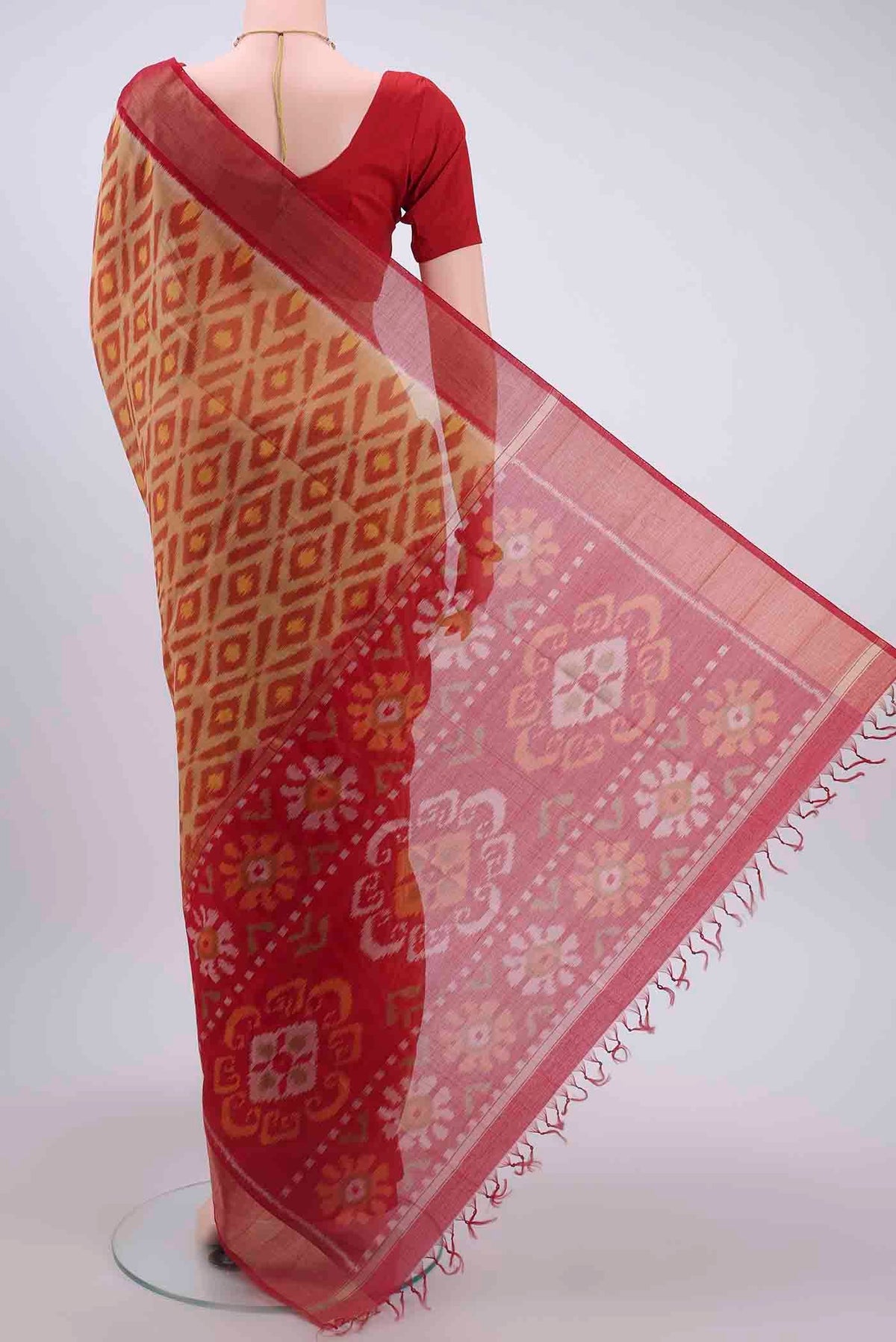 Flat view of Beige Kora Cotton Saree with Ikat design on the body and Zari Border