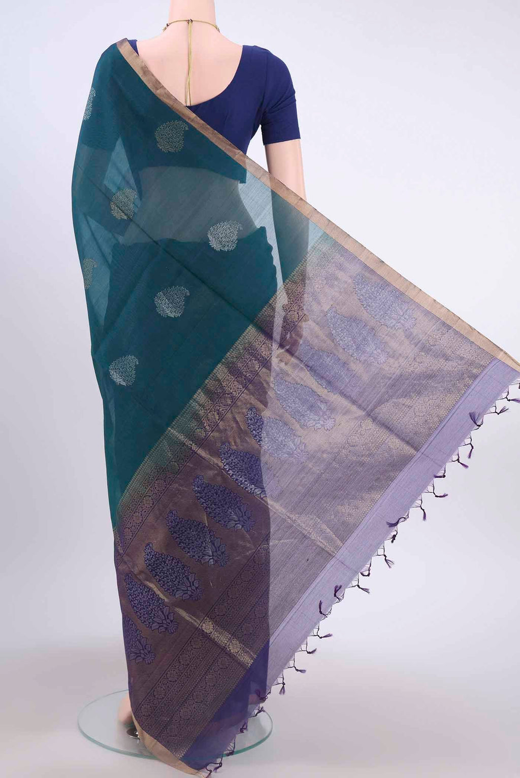 Flat view of Blue Kora Cotton Saree with Zari Butta on the body and Zari Border