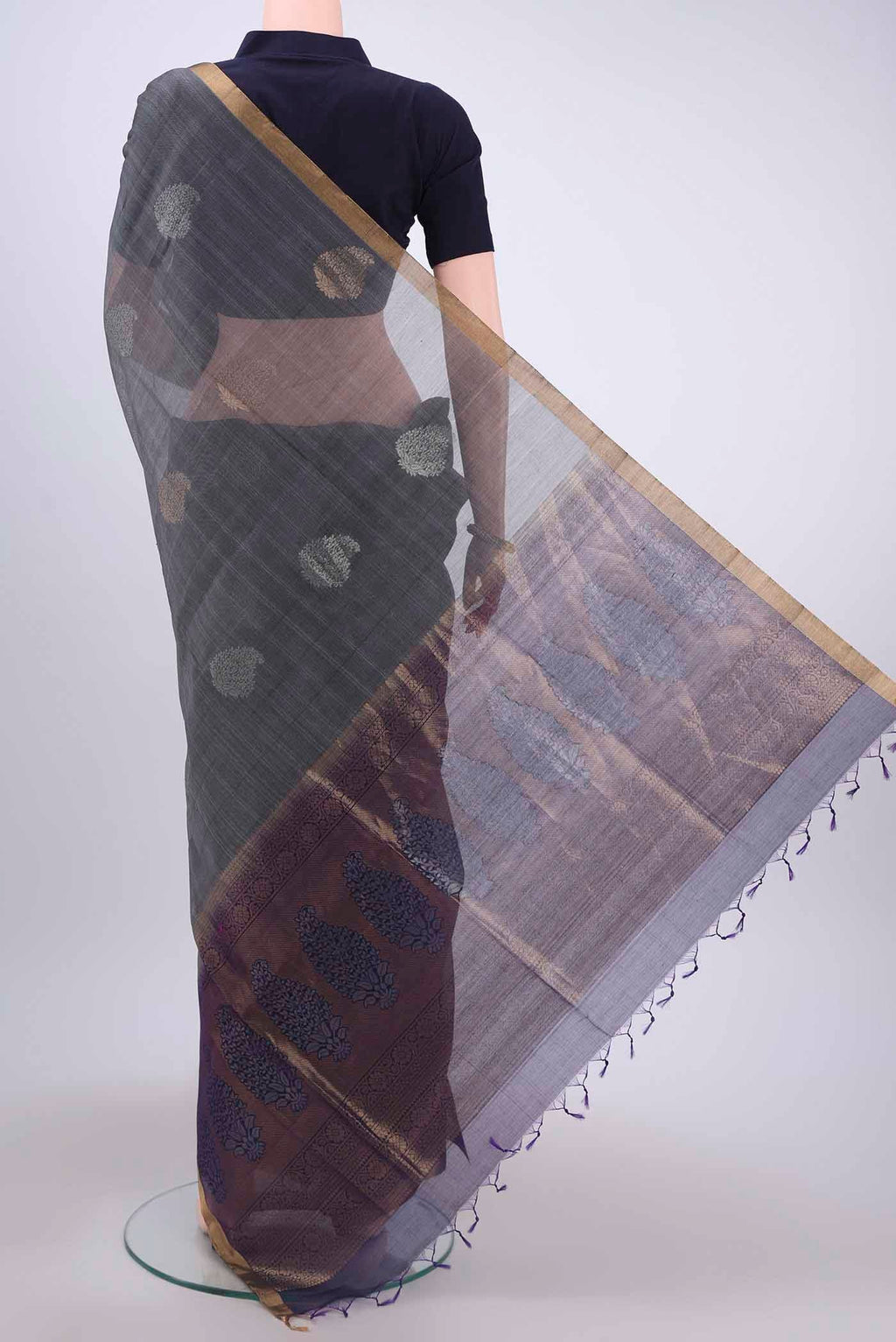 Flat view of Grey Kora Cotton Saree with Zari Butta on the body and Zari Border