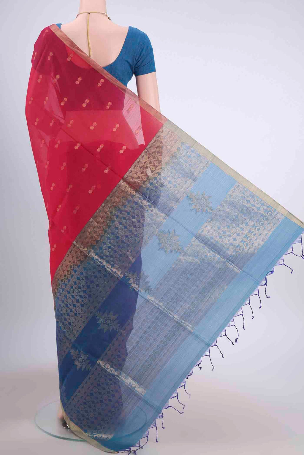 Flat view of Imperial Red Kora Cotton Saree with Zari Butta on the body and Zari Border