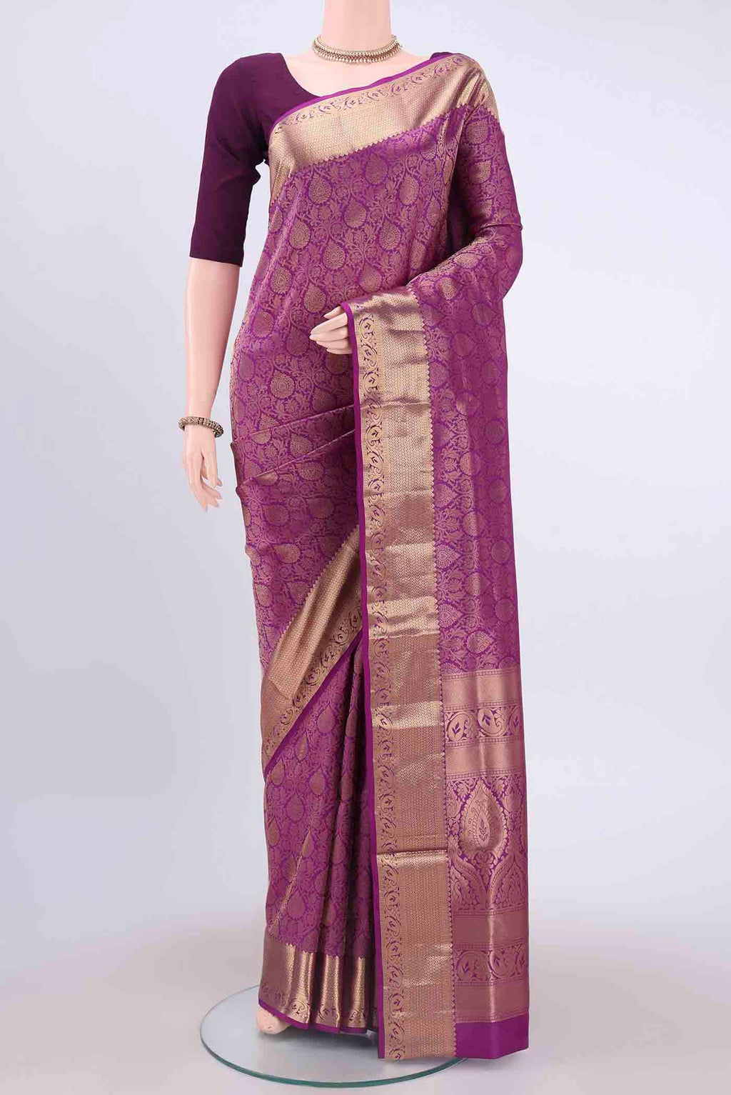 Purple Soft Silk Saree with Jacquard With Zari Butta on the body and Zari Border displayed on a mannequin