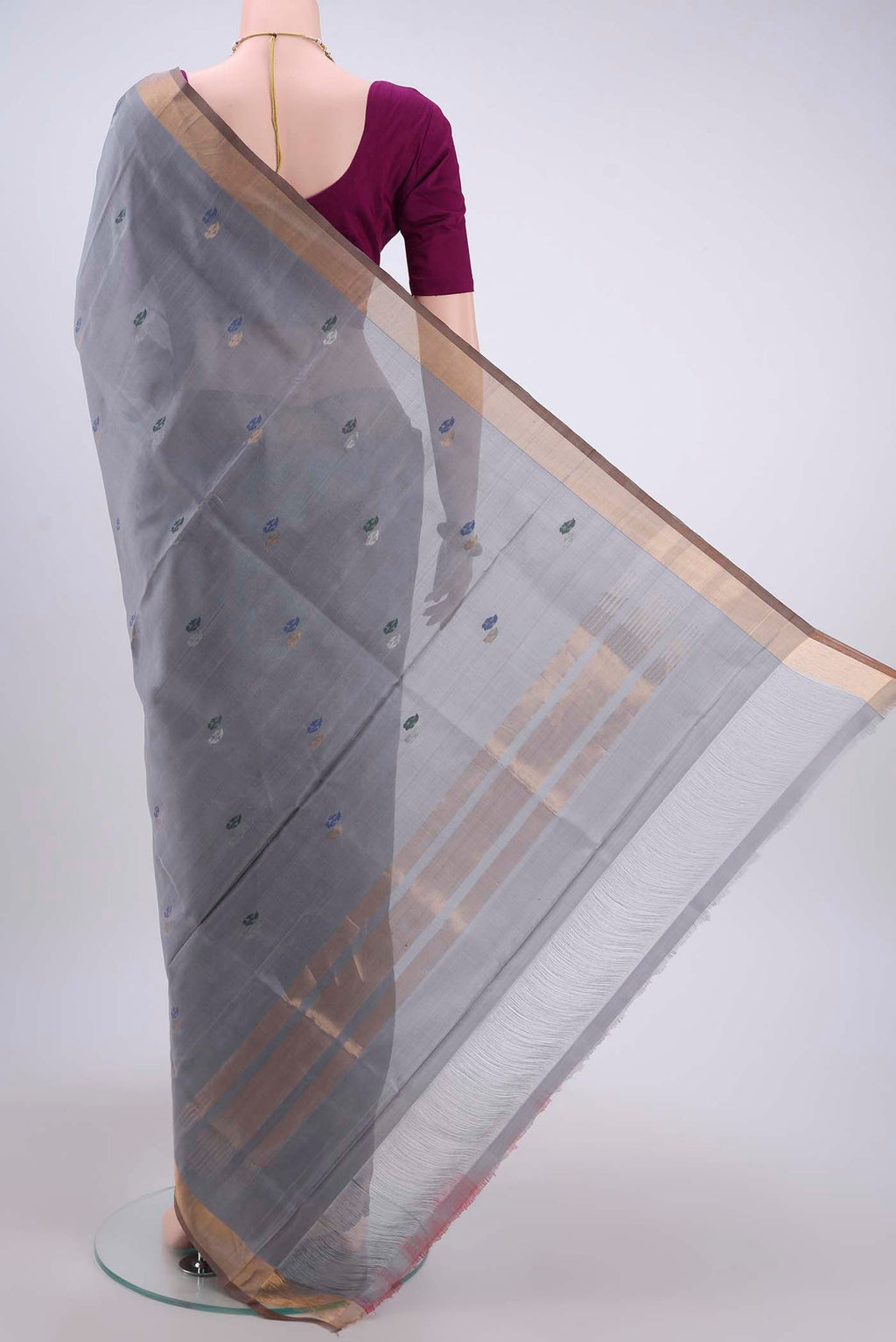 Flat view of Blue Grey Uppada Silk Saree with Zari Butta on the body and Zari Border
