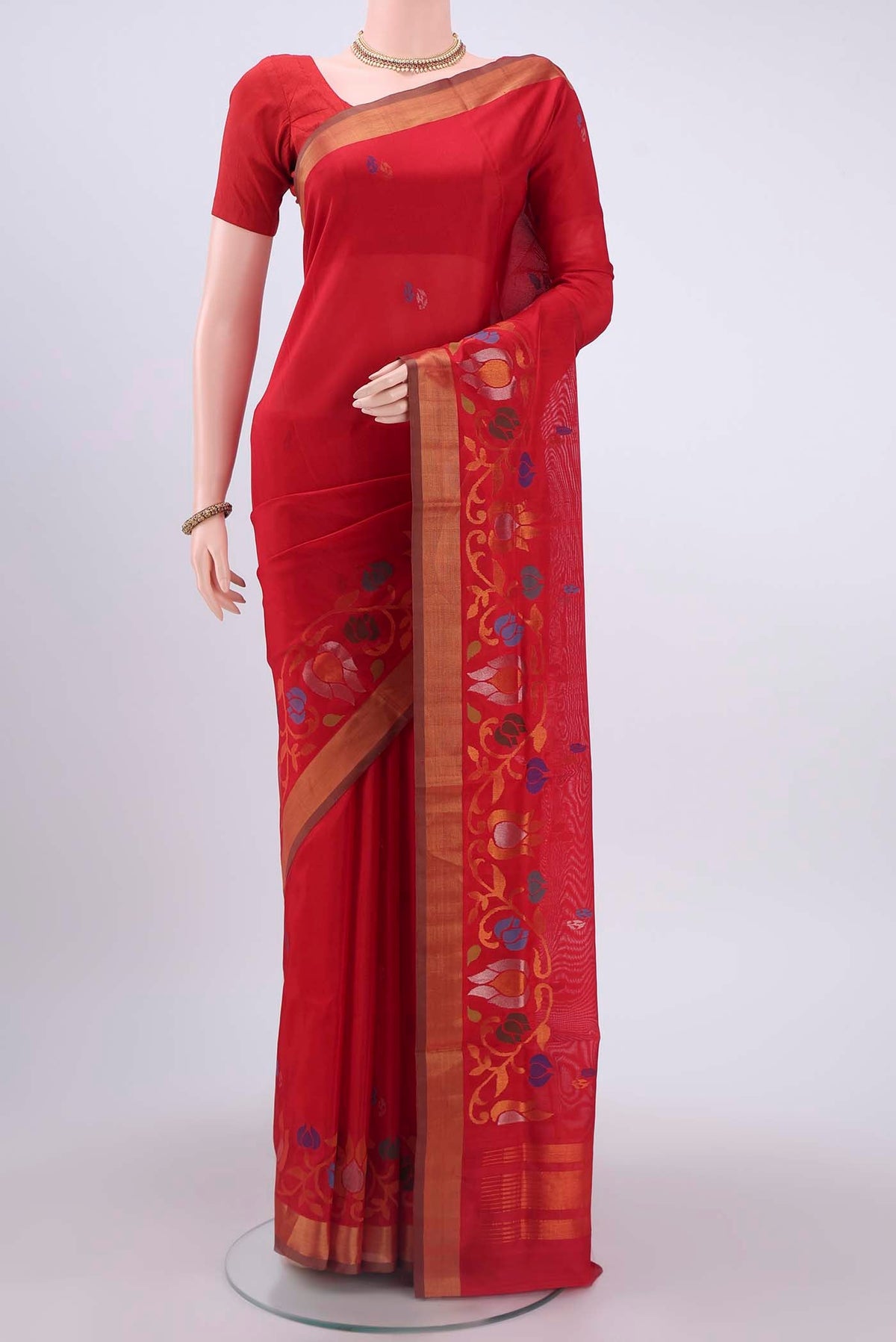 Red Uppada Silk Saree with Zari And Thread Butta on the body and Zari Border displayed on a mannequin