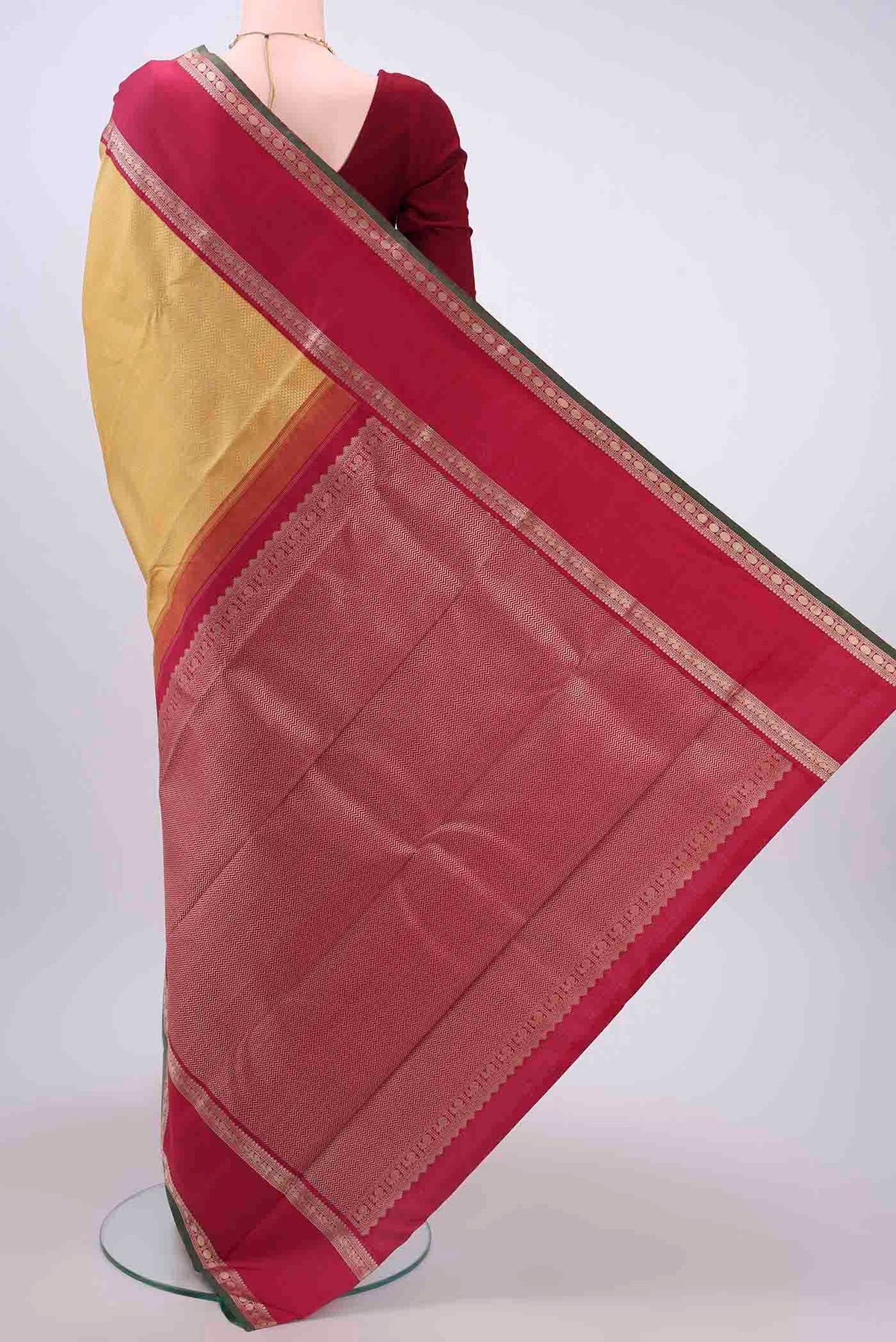 Flat view of Yellow Kanchipuram Silk Saree with Jacquard design on the body and Thread Border