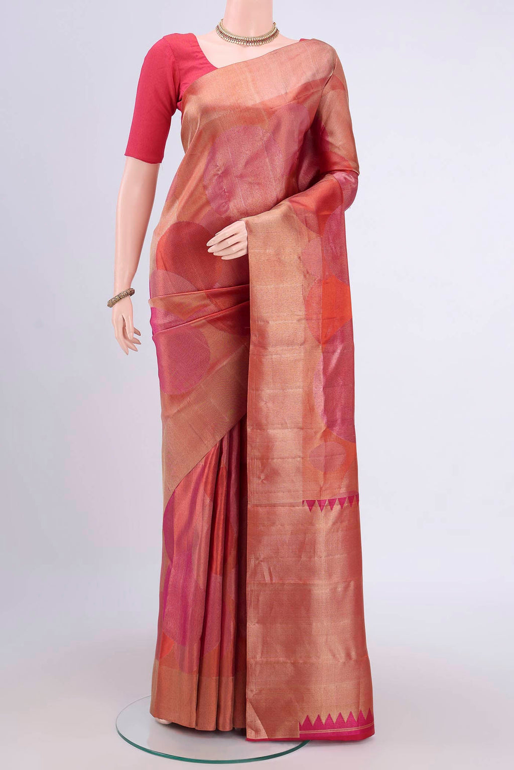 Multi Color Kanjivaram Saree with Zari Brocade on the body and Rising Temple Border.  displayed on a mannequin