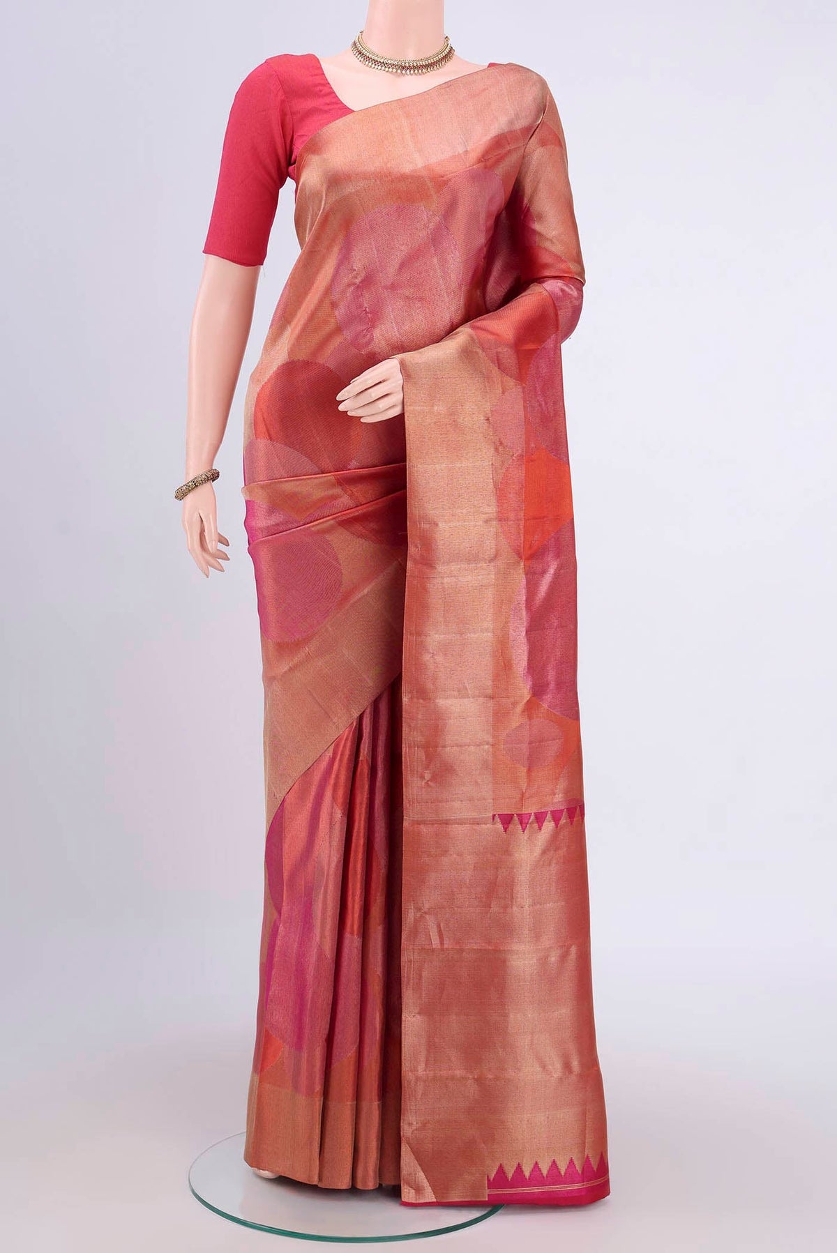 Multi Color Kanjivaram Saree with Zari Brocade on the body and Rising Temple Border.  displayed on a mannequin