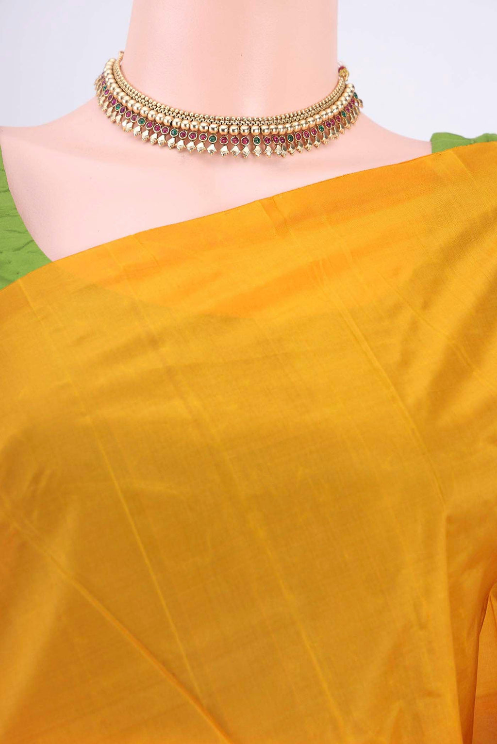 Border image of Mustard Kanchipuram Silk Saree with Zari Butta on the body and One Side Border