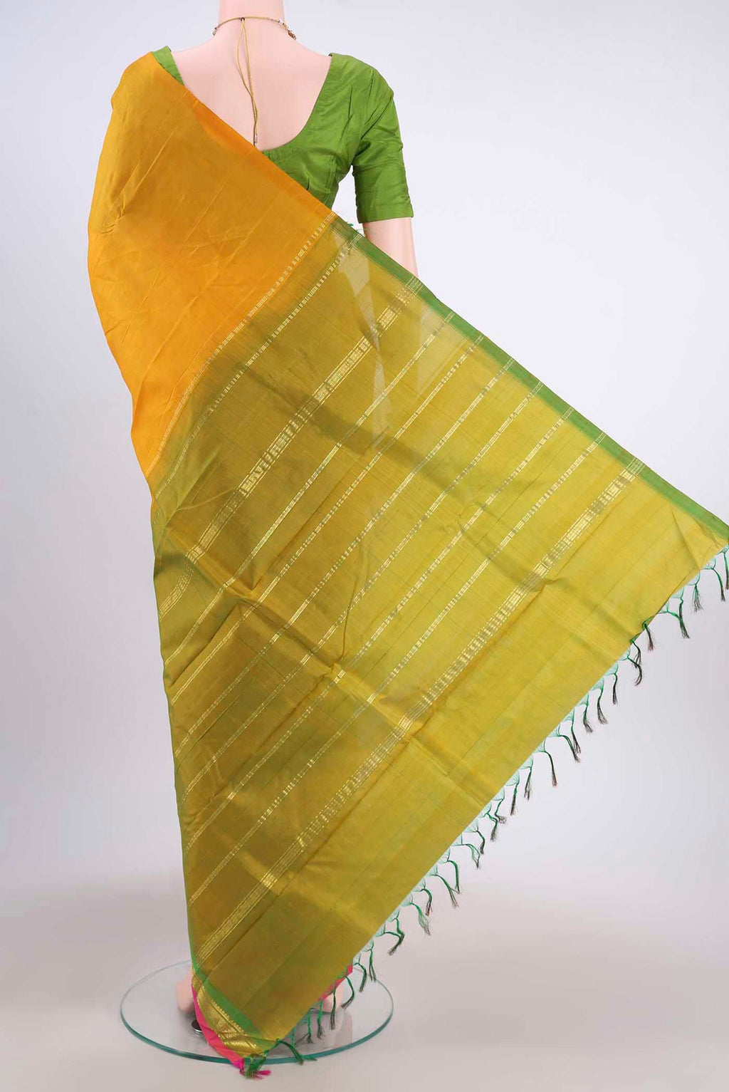 Flat view of Mustard Kanchipuram Silk Saree with Zari Butta on the body and One Side Border