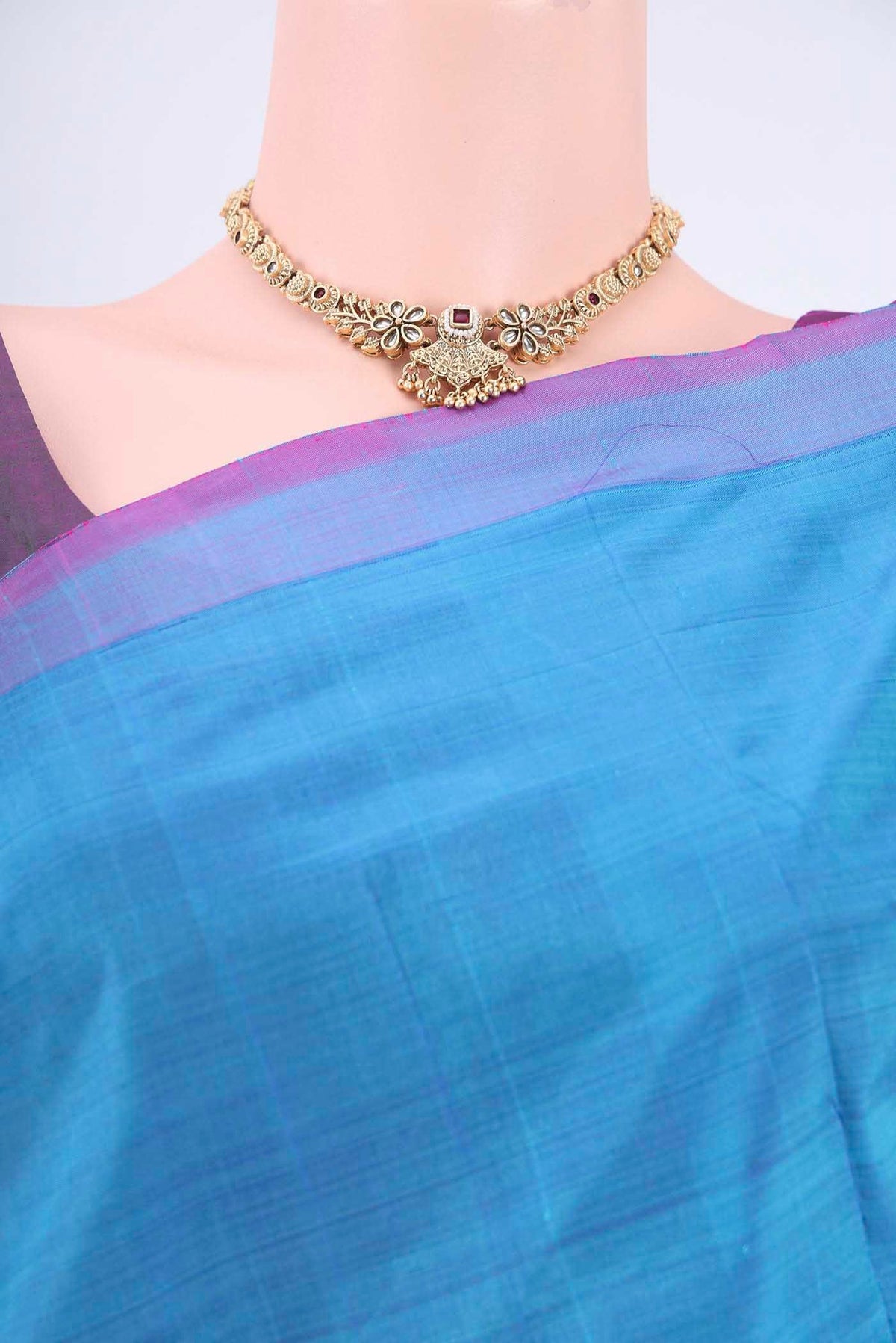 Border image of Turquoise Kanchipuram Silk Saree with Zari Butta on the body and One Side Border