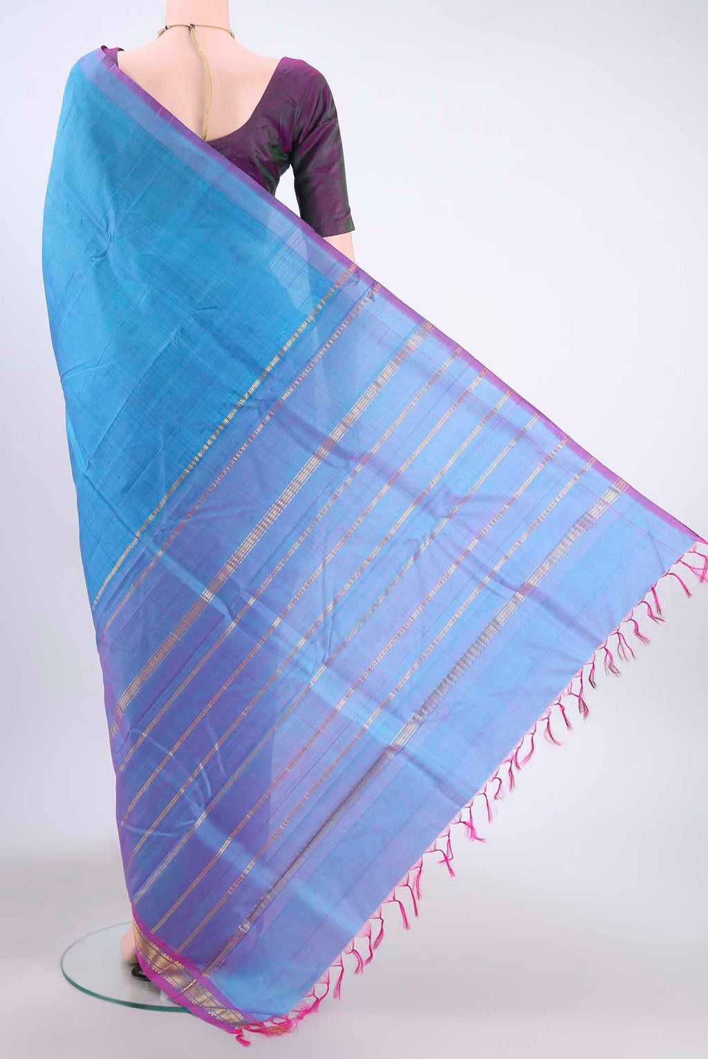 Flat view of Turquoise Kanchipuram Silk Saree with Zari Butta on the body and One Side Border