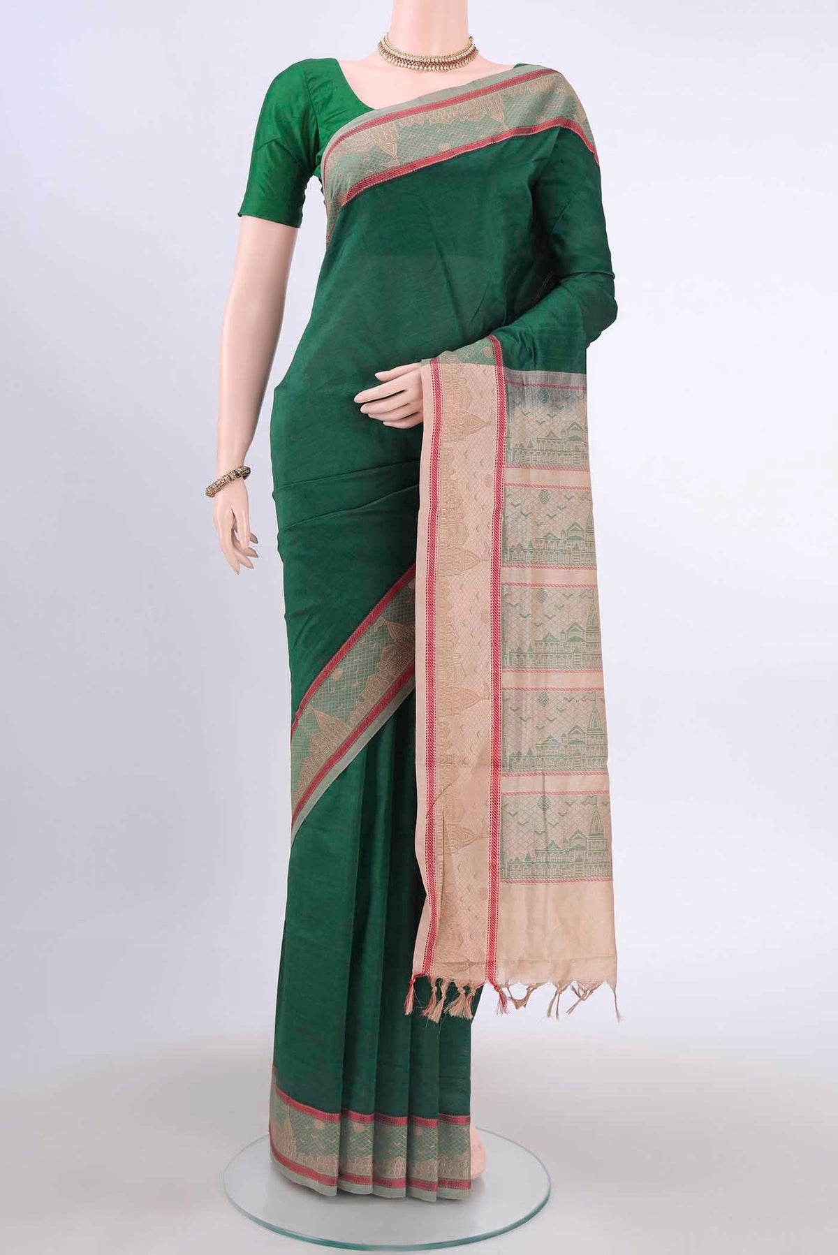 Green Poly Cotton Saree with Plain Body and Thread Border displayed on a mannequin