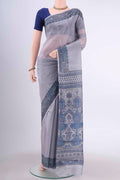Mauve Printed Silk Saree with Floral Print on the body and Printed Border displayed on a mannequin