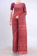 Peach Printed Silk Saree with Floral Print on the body and Without Border displayed on a mannequin