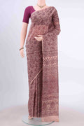 Peach Printed Silk Saree with Floral Print on the body and Plain Border displayed on a mannequin