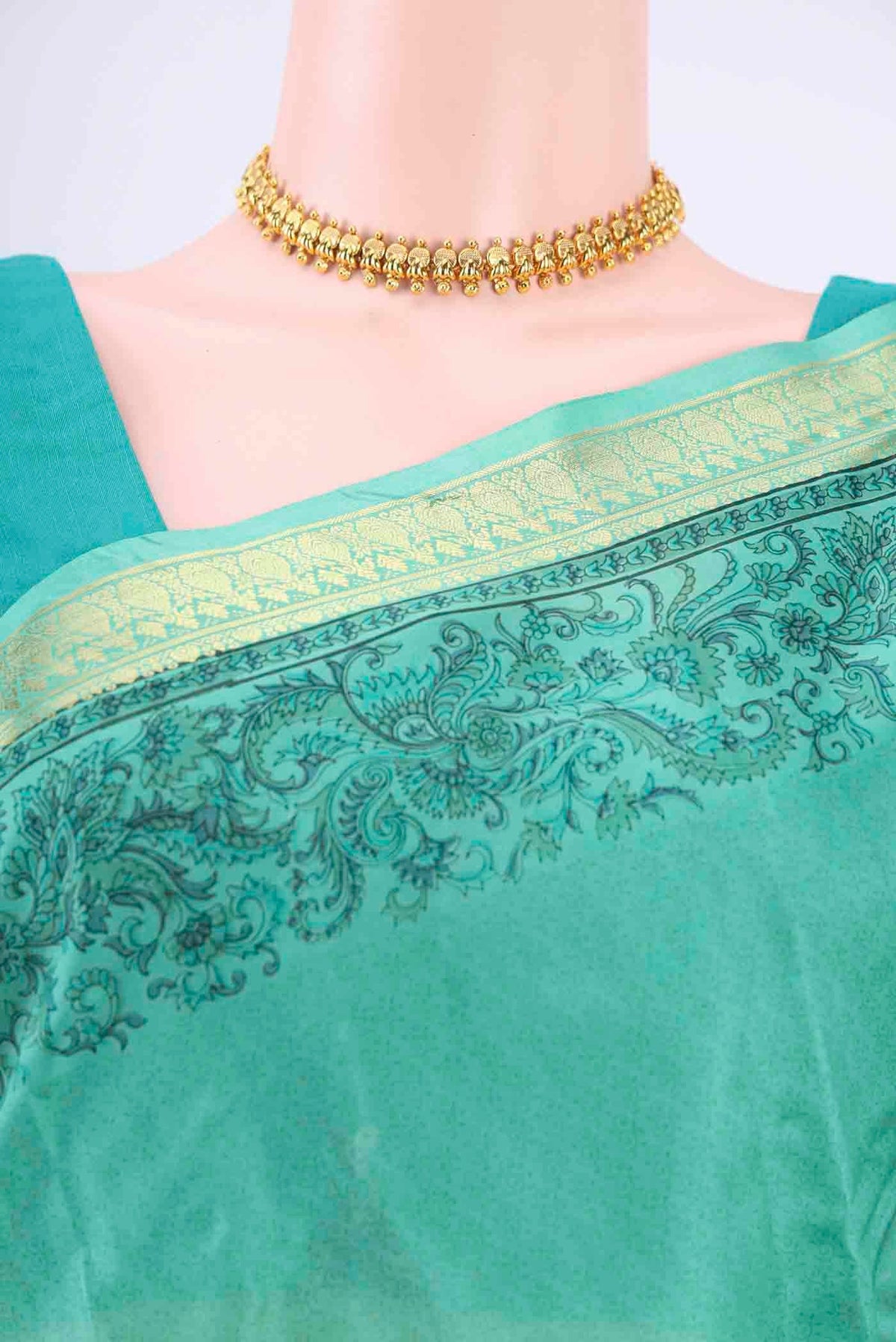 Border image of Light Green Printed Silk Saree with Floral Print on the body and Zari Border