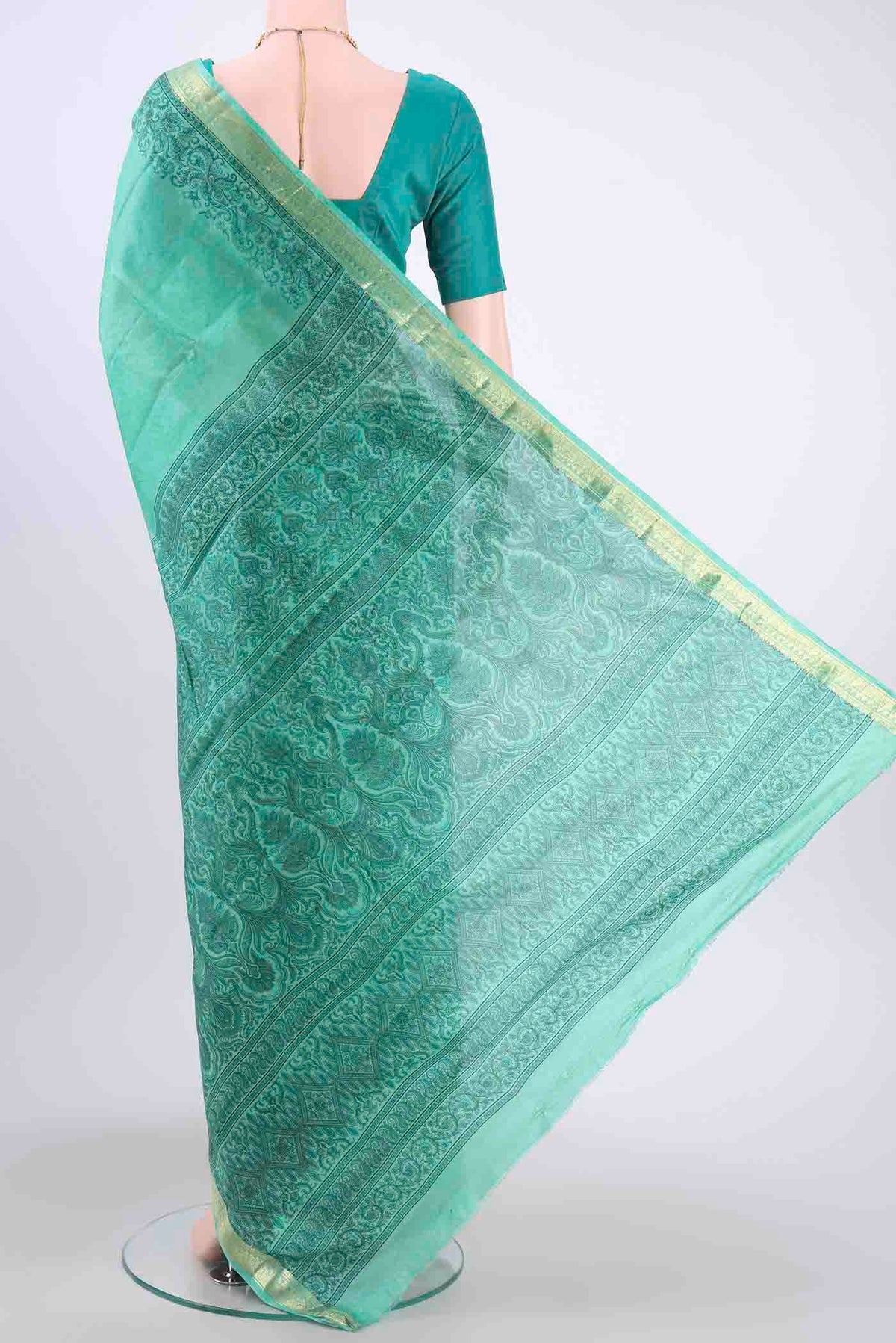 Flat view of Light Green Printed Silk Saree with Floral Print on the body and Zari Border