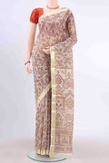 Off White Printed Silk Saree with Floral Print on the body and Zari Border displayed on a mannequin