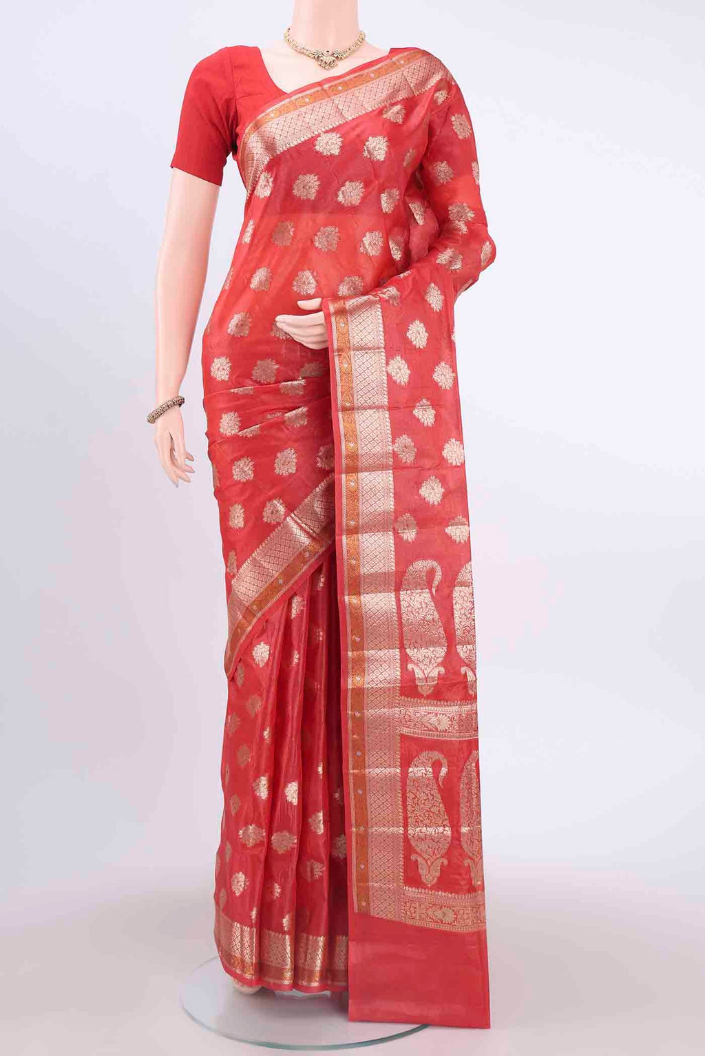 Red Banarasi Tussar Silk Saree with Zari Butta on the body and Zari Border displayed on a mannequin
