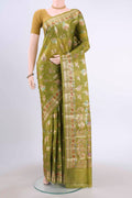 Green Banarasi Tussar Silk Saree with Zari And Thread Butta on the body and Zari And Thread Border displayed on a mannequin