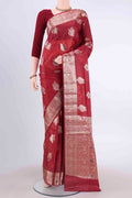 Maroon Banarasi Tussar Silk Saree with Zari And Thread Butta on the body and Zari And Thread Border displayed on a mannequin