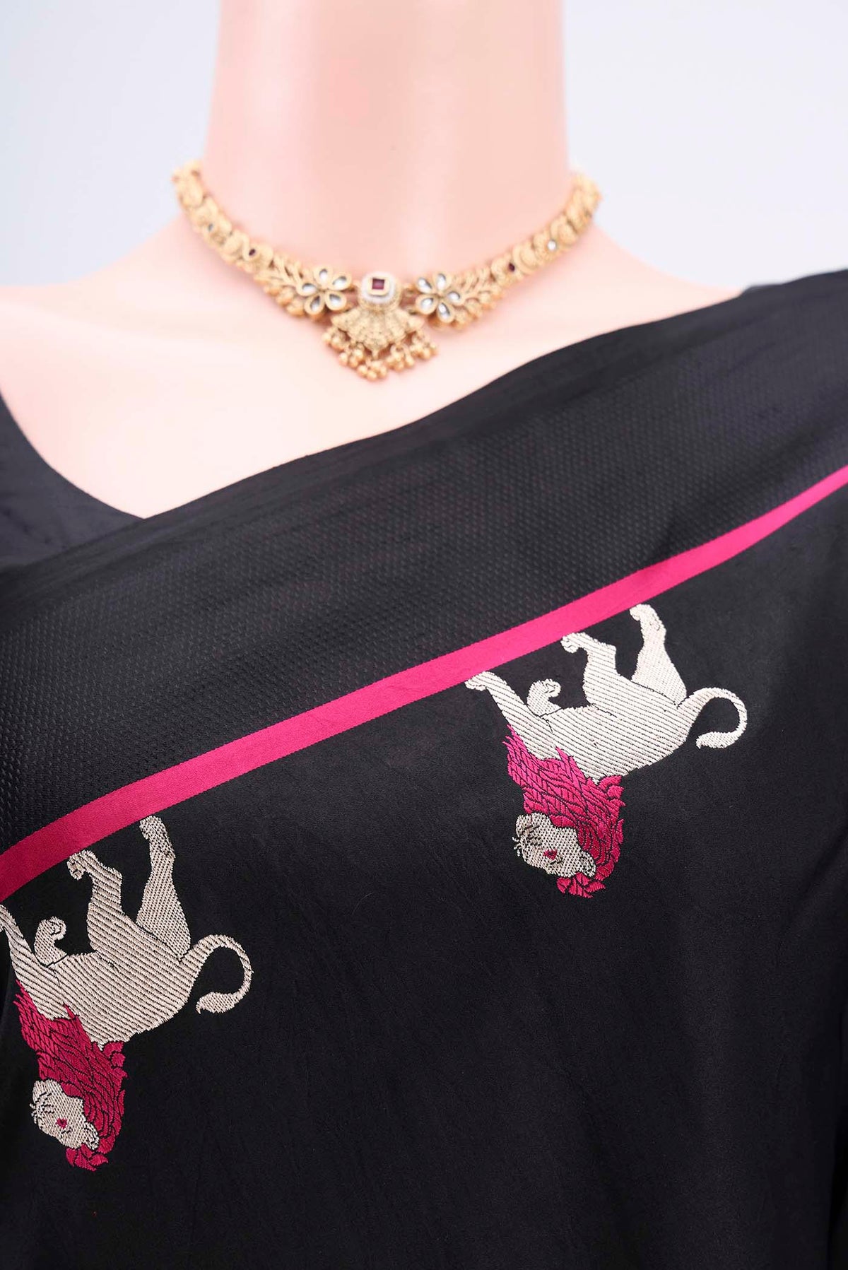 Border image of Black Banarasi Silk Saree with Plain Body and Zari And Thread Border. 