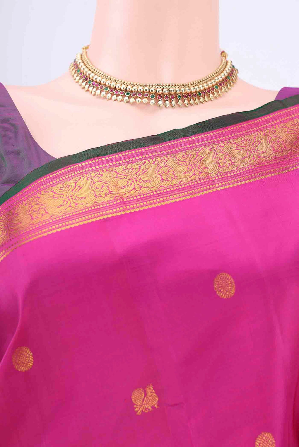 Border image of Dark Pink Kanchipuram Silk Saree with Zari Butta on the body and Zari Border