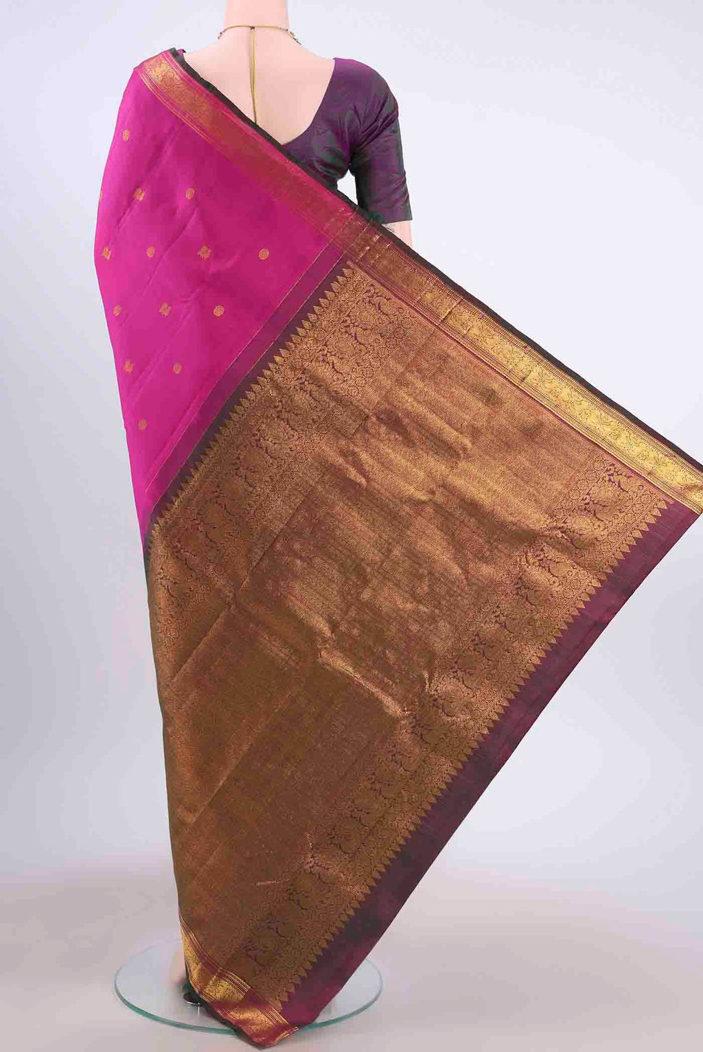 Flat view of Dark Pink Kanchipuram Silk Saree with Zari Butta on the body and Zari Border