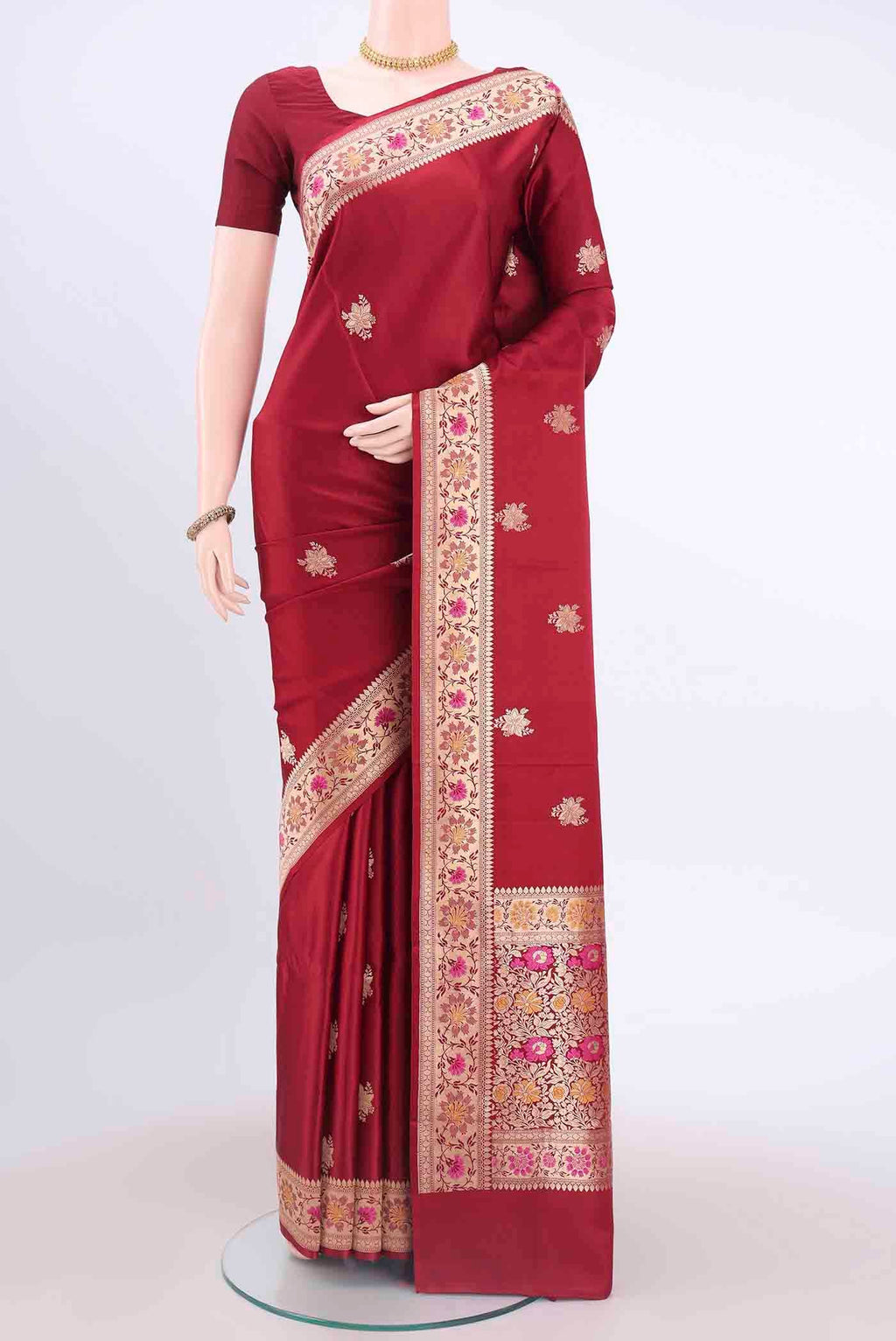 Red Banarasi Katan Silk Saree with Zari Butta on the body and Meenakari Border displayed on a mannequin