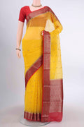 Yellow Organza Silk Saree with Zari Butta on the body and Zari Border displayed on a mannequin