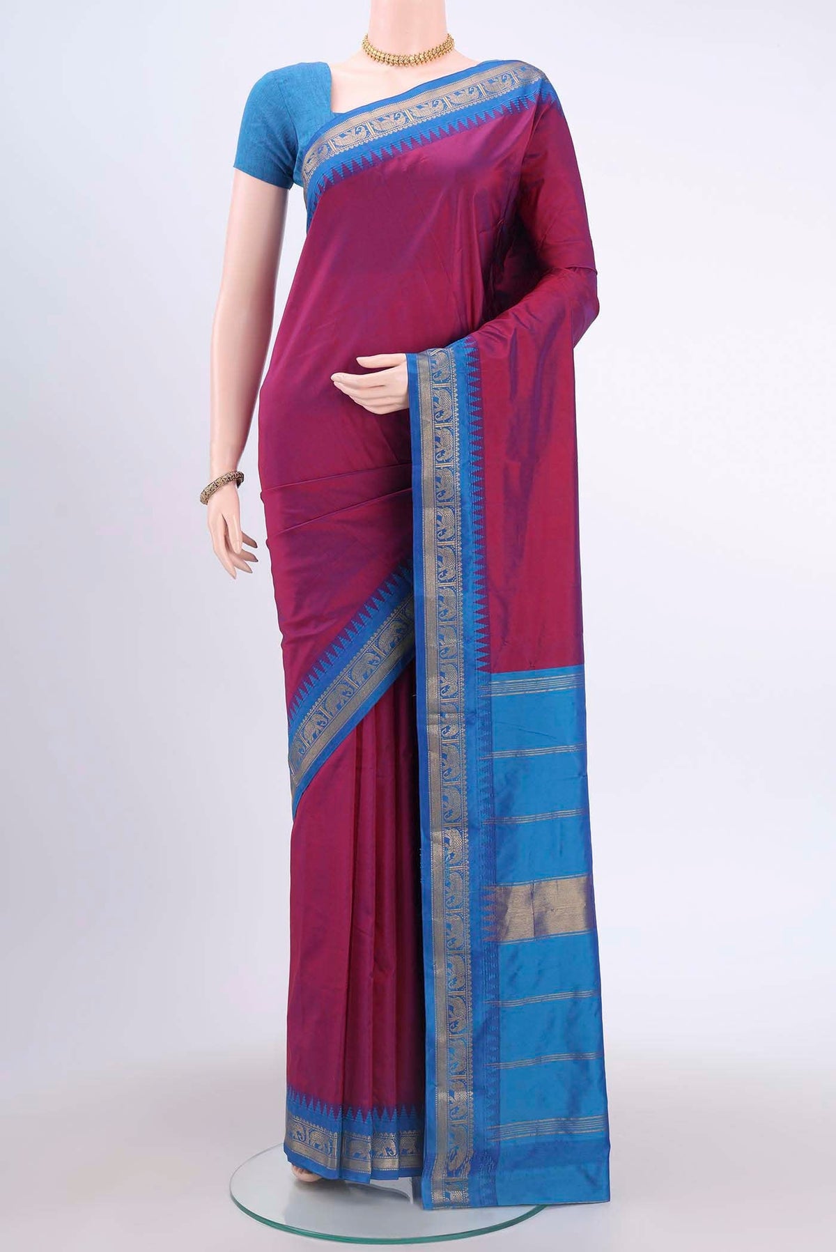 Magenta Blended Bangalore Silk Saree with Plain Body and Temple Border displayed on a mannequin