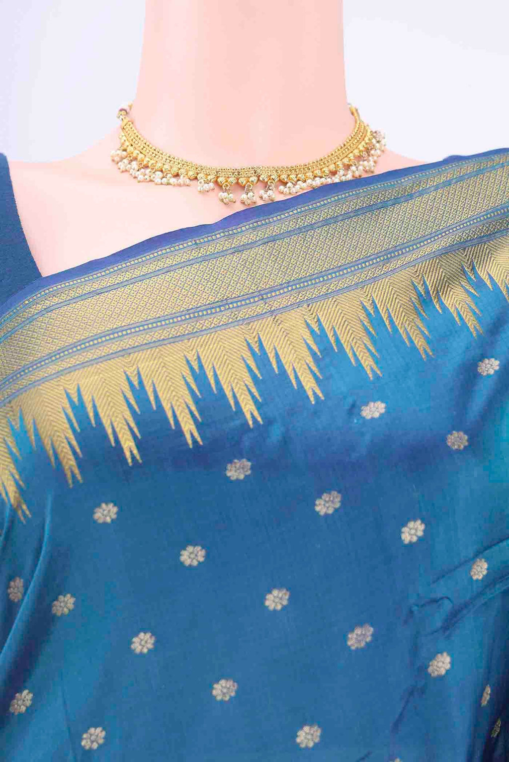 Border image of Blue Blended Bangalore Silk Saree with Zari Butta on the body and Zari Border