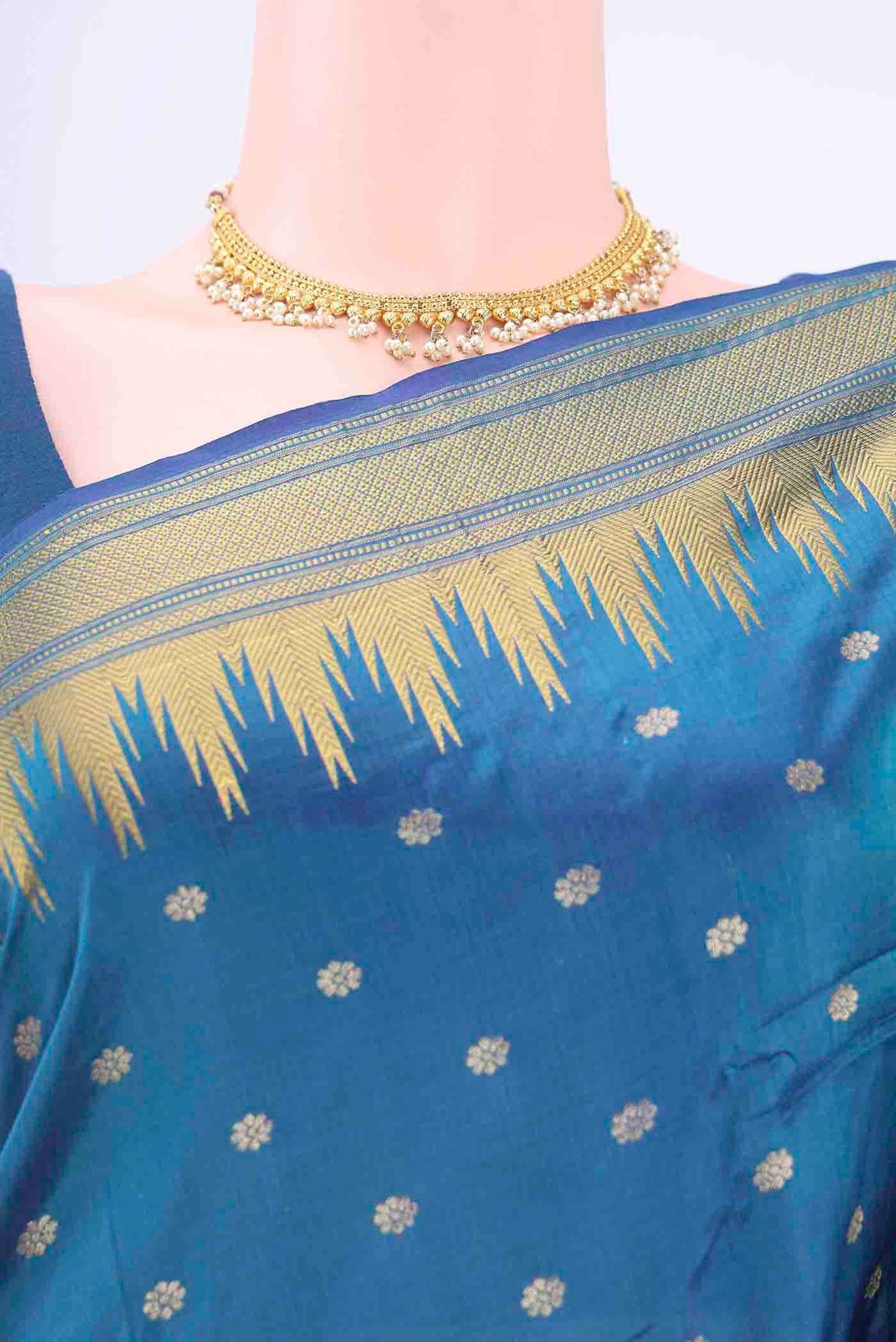 Border image of Blue Blended Bangalore Silk Saree with Zari Butta on the body and Zari Border
