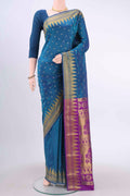 Blue Blended Bangalore Silk Saree with Zari Butta on the body and Zari Border displayed on a mannequin