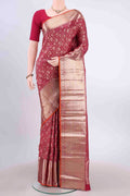 Maroon Kanchipuram Silk Saree with Zari Brocade on the body and Zari Border displayed on a mannequin